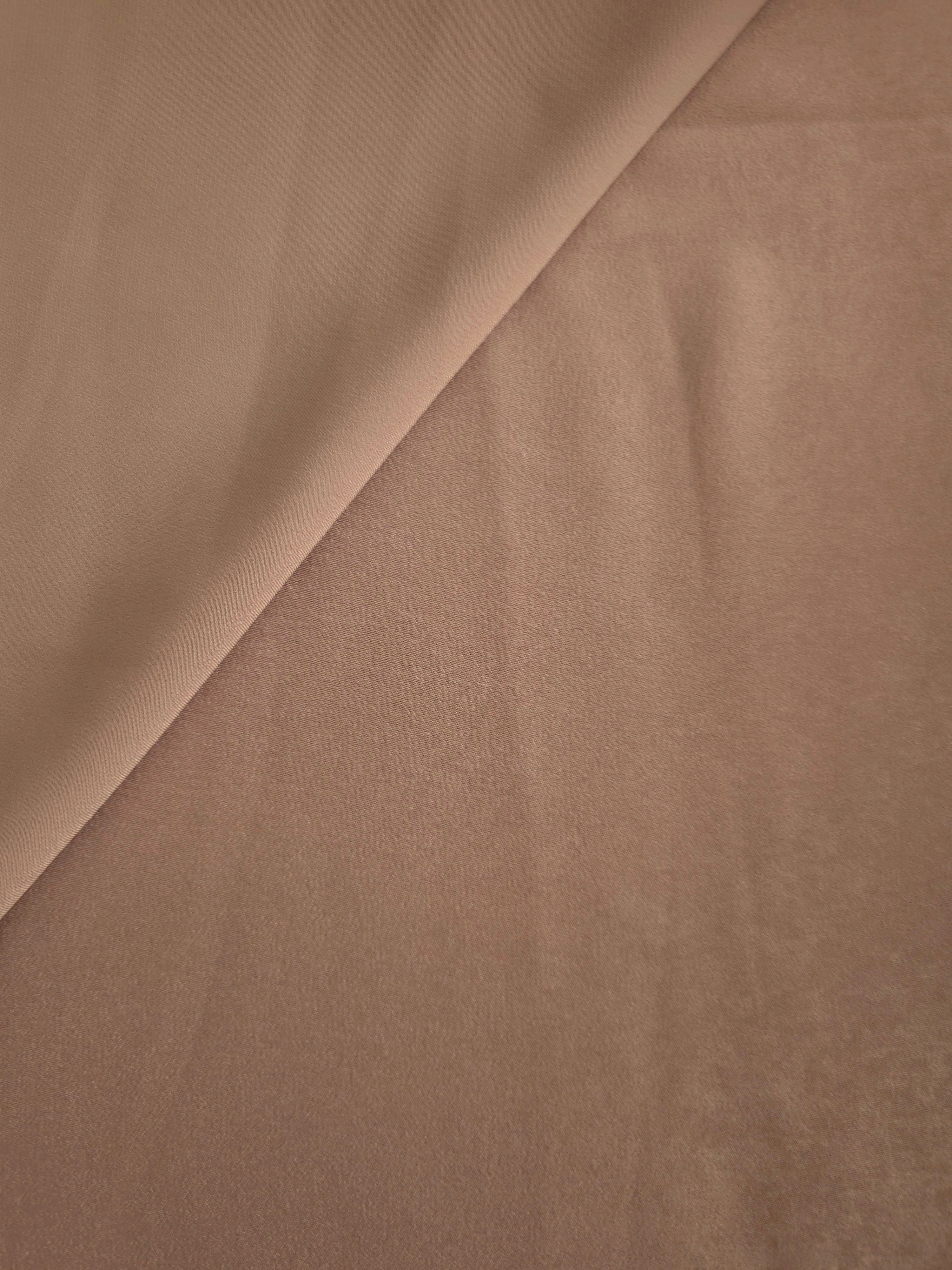 Close-up of Cappuccino Taupe Milano sandwashed silky fabric showing its smooth matte texture and soft surface