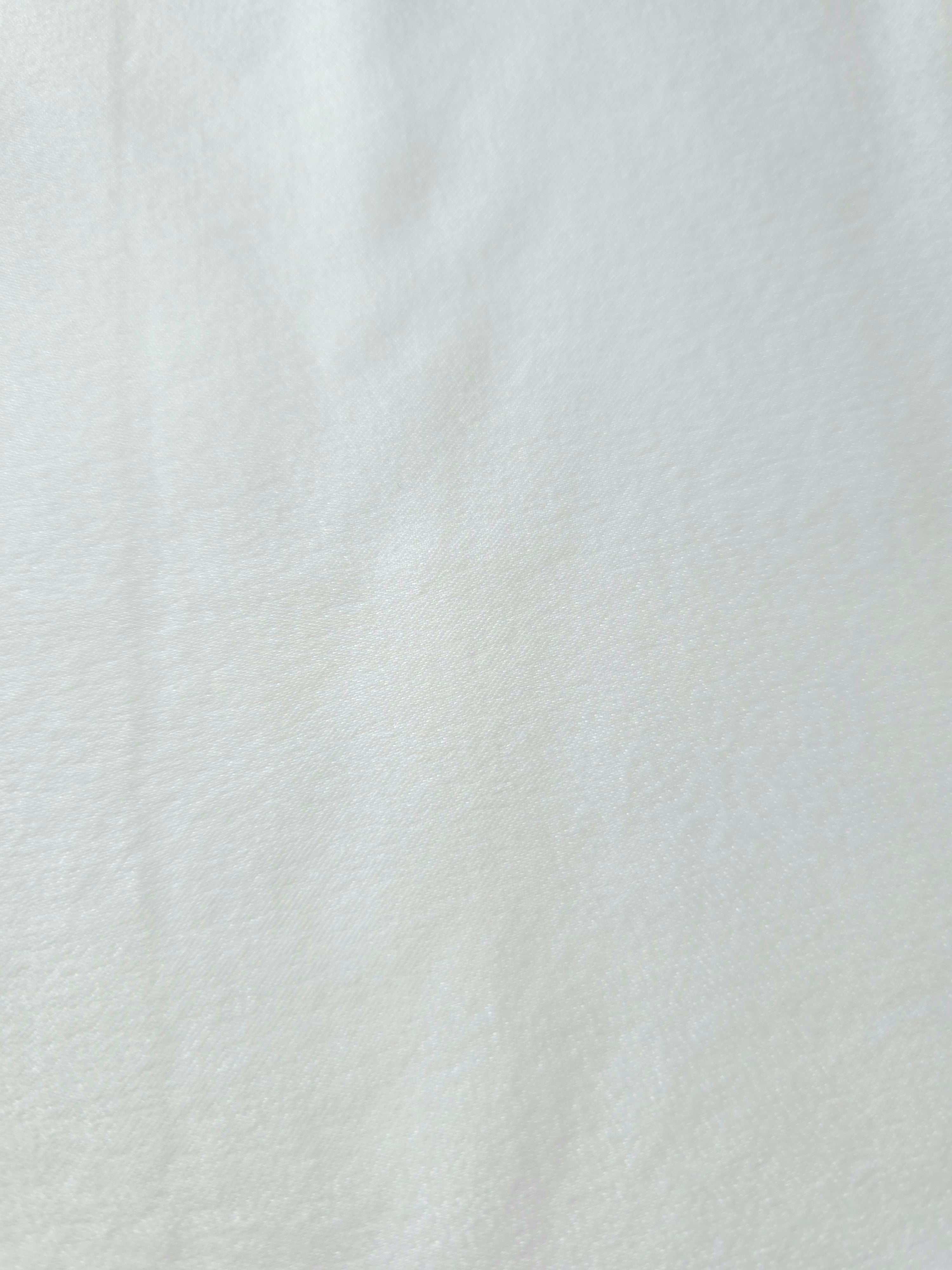 Frosted Silver Milano sandwashed silky fabric with a soft fluid drape and smooth flowing folds