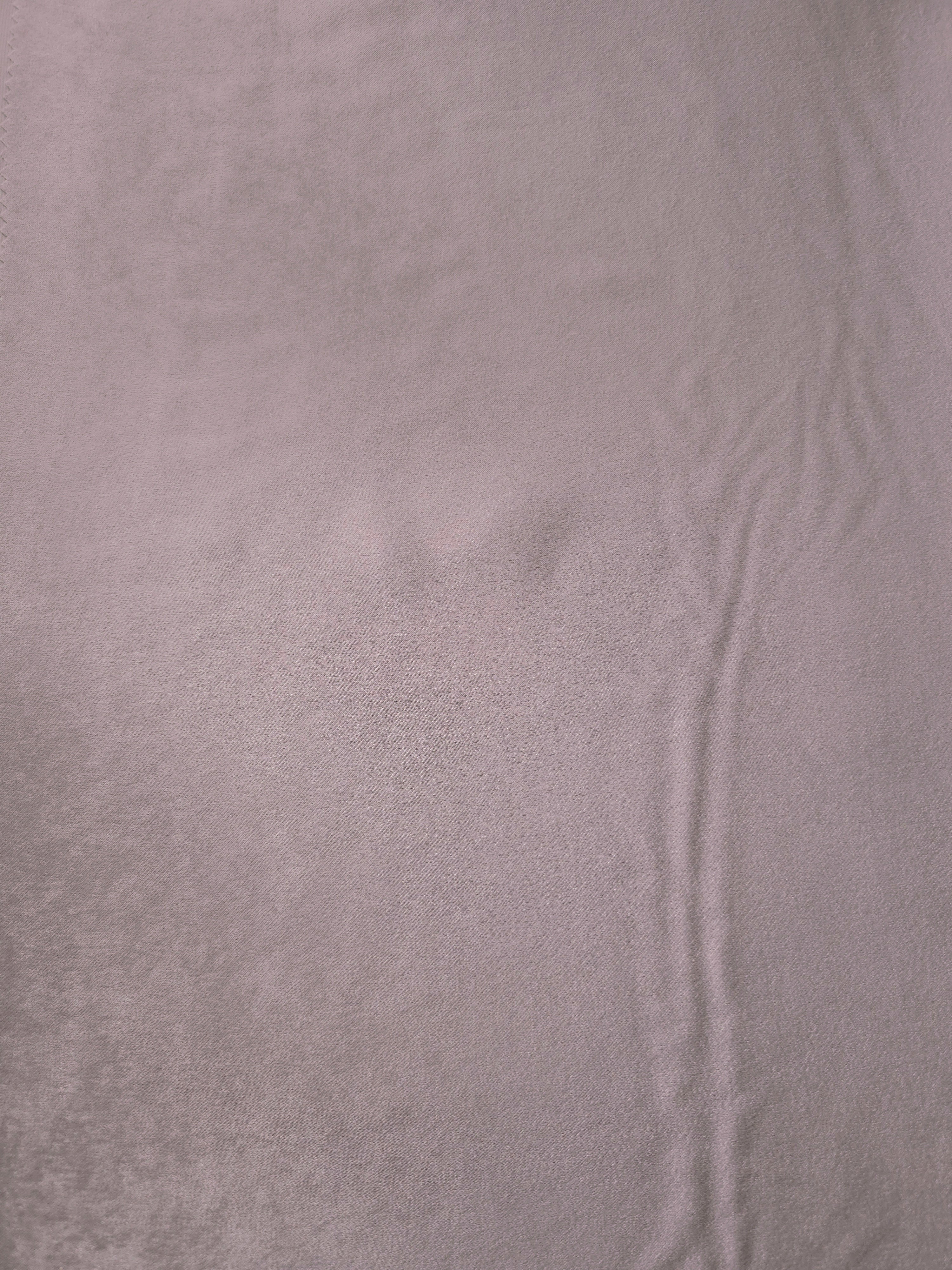 Draped Mauve Stone Milano matte sandwashed silky fabric showing fluid movement for dresses and occasionwear