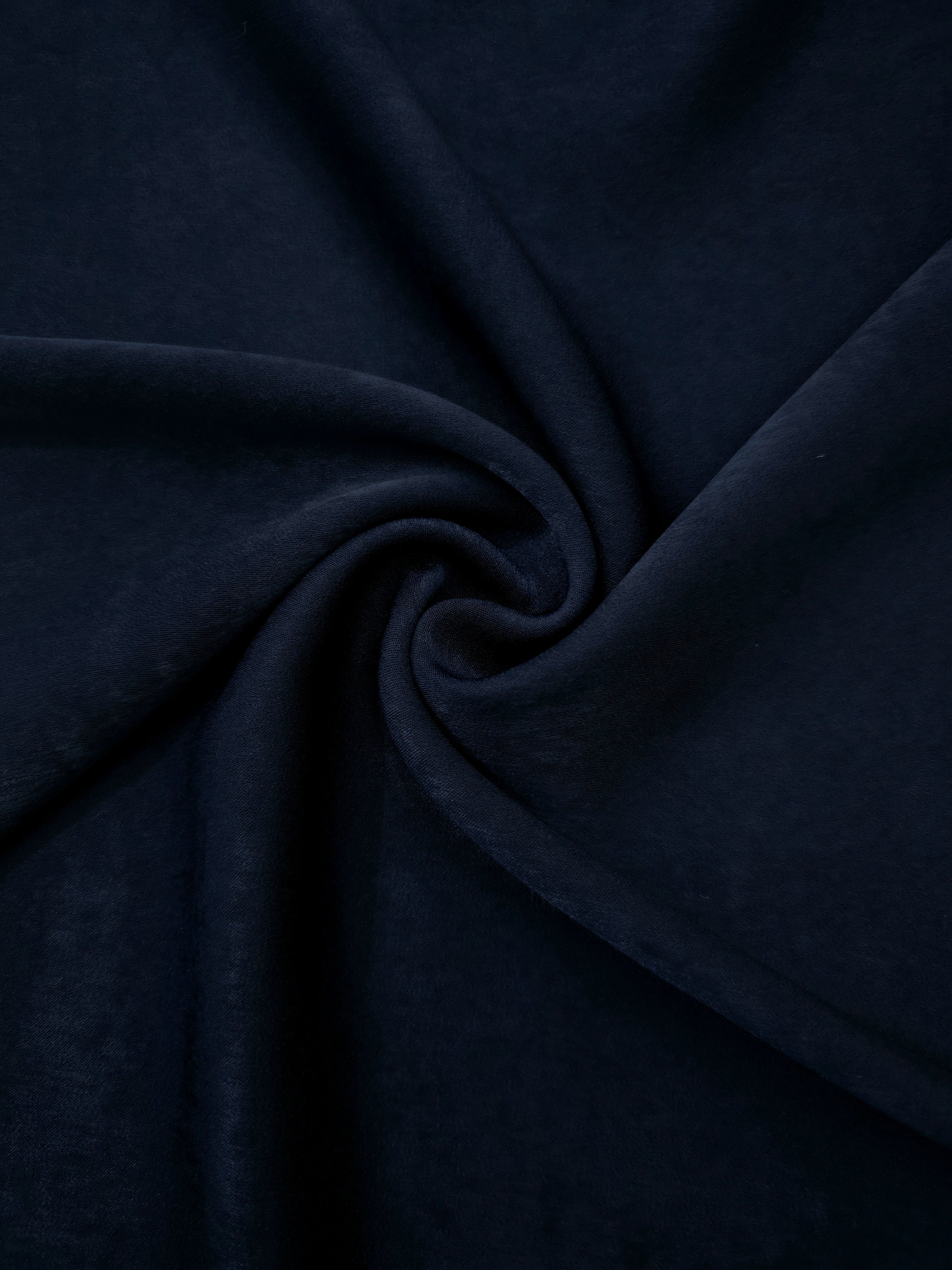 Milano matte sandwashed silky fabric in Midnight Ink, shown as a soft textile for dresses, blouses and apparel