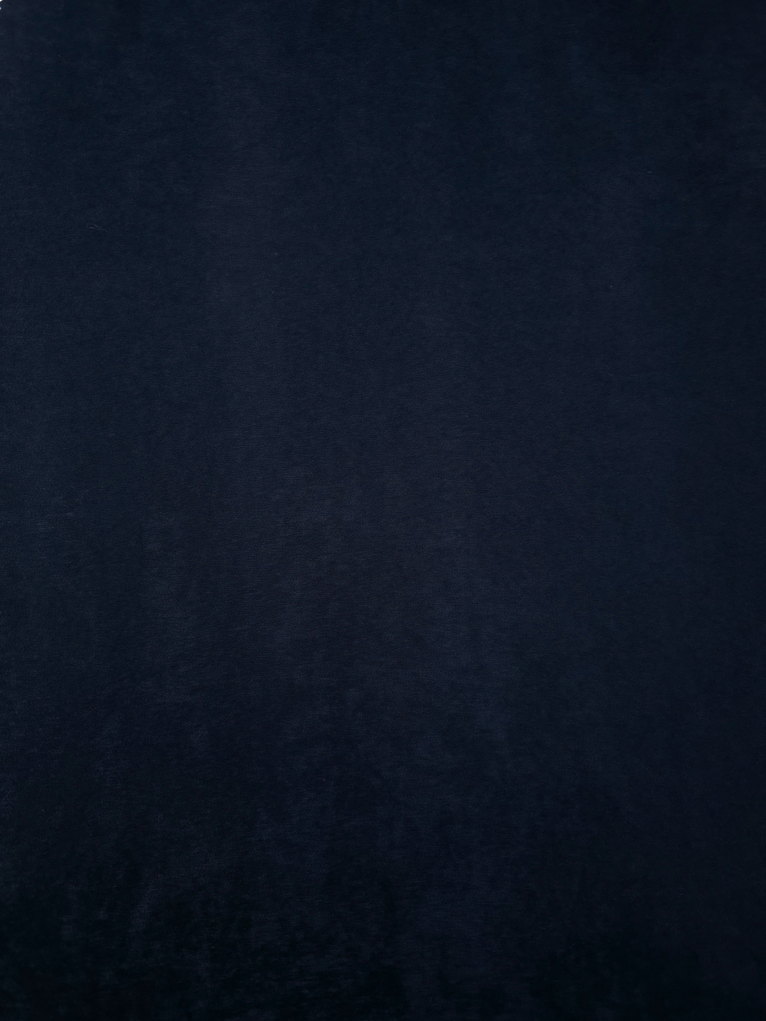 Draped Midnight Ink Milano matte sandwashed silky fabric showing fluid movement for dresses and occasionwear
