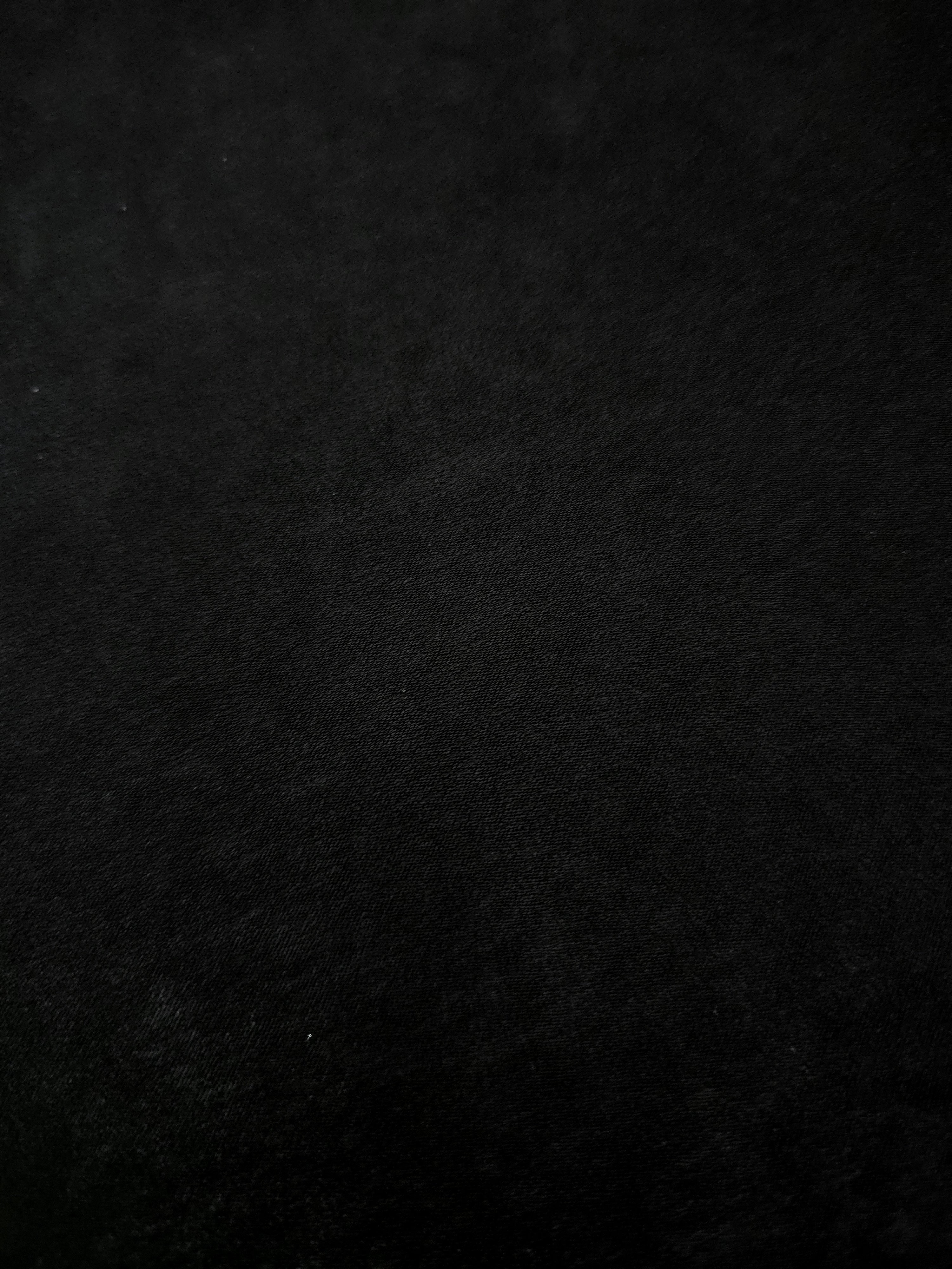 Draped Obsidian Black Milano matte sandwashed silky fabric showing fluid movement for dresses and occasionwear