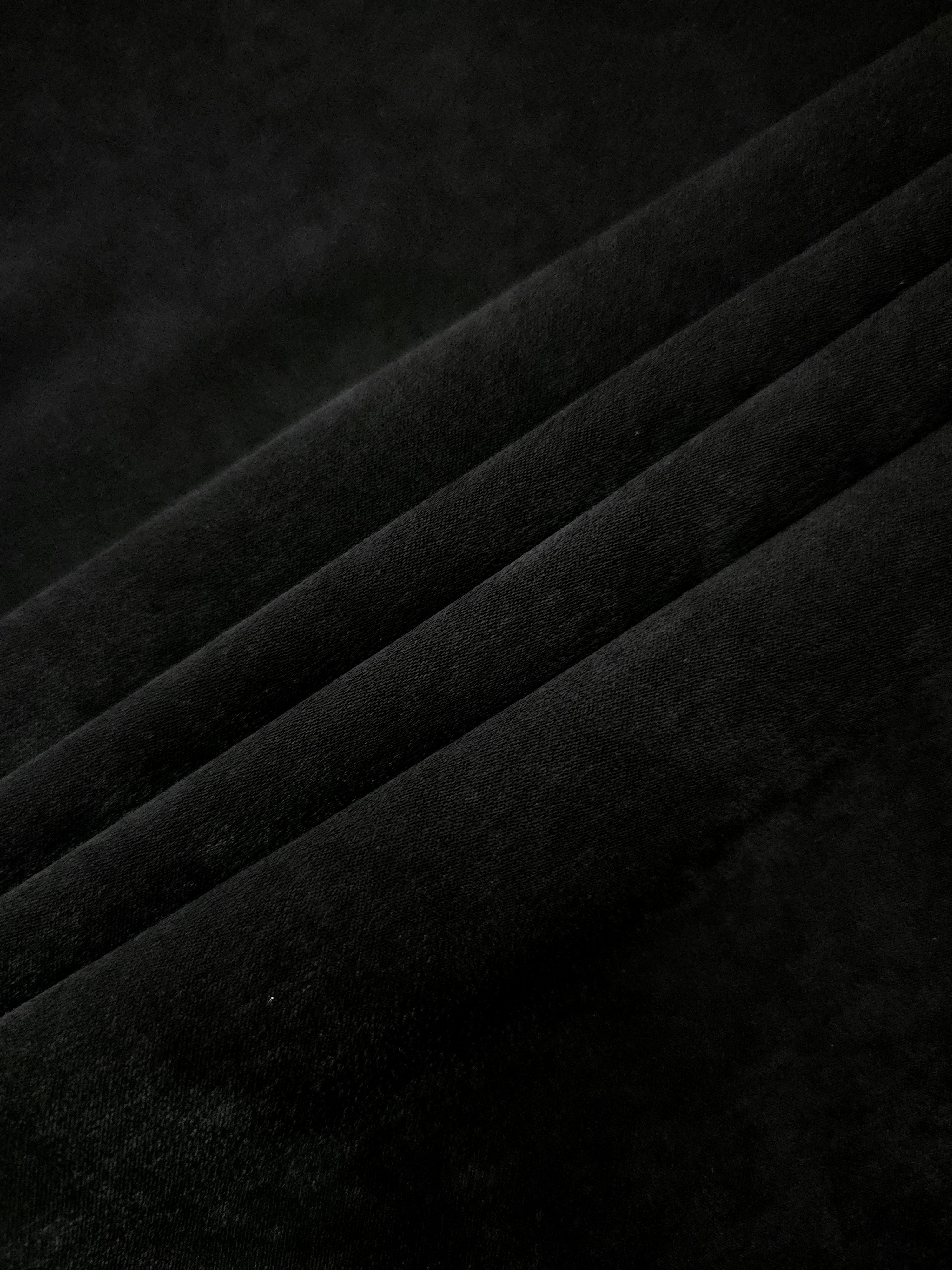 Wholesale Obsidian Black Milano matte sandwashed silky fabric for garment production and apparel projects
