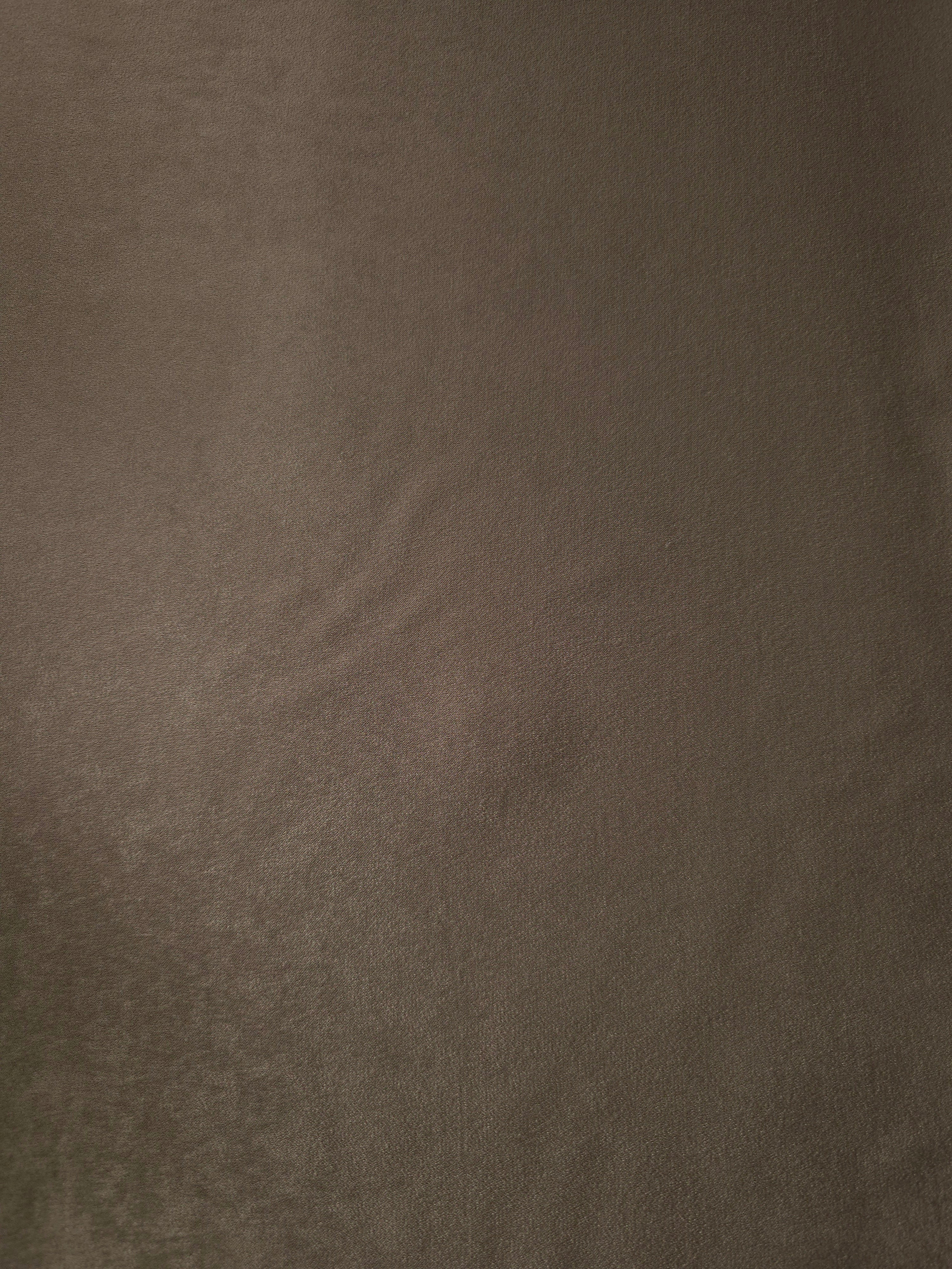 Draped Olive Walnut Milano matte sandwashed silky fabric showing fluid movement for dresses and occasionwear