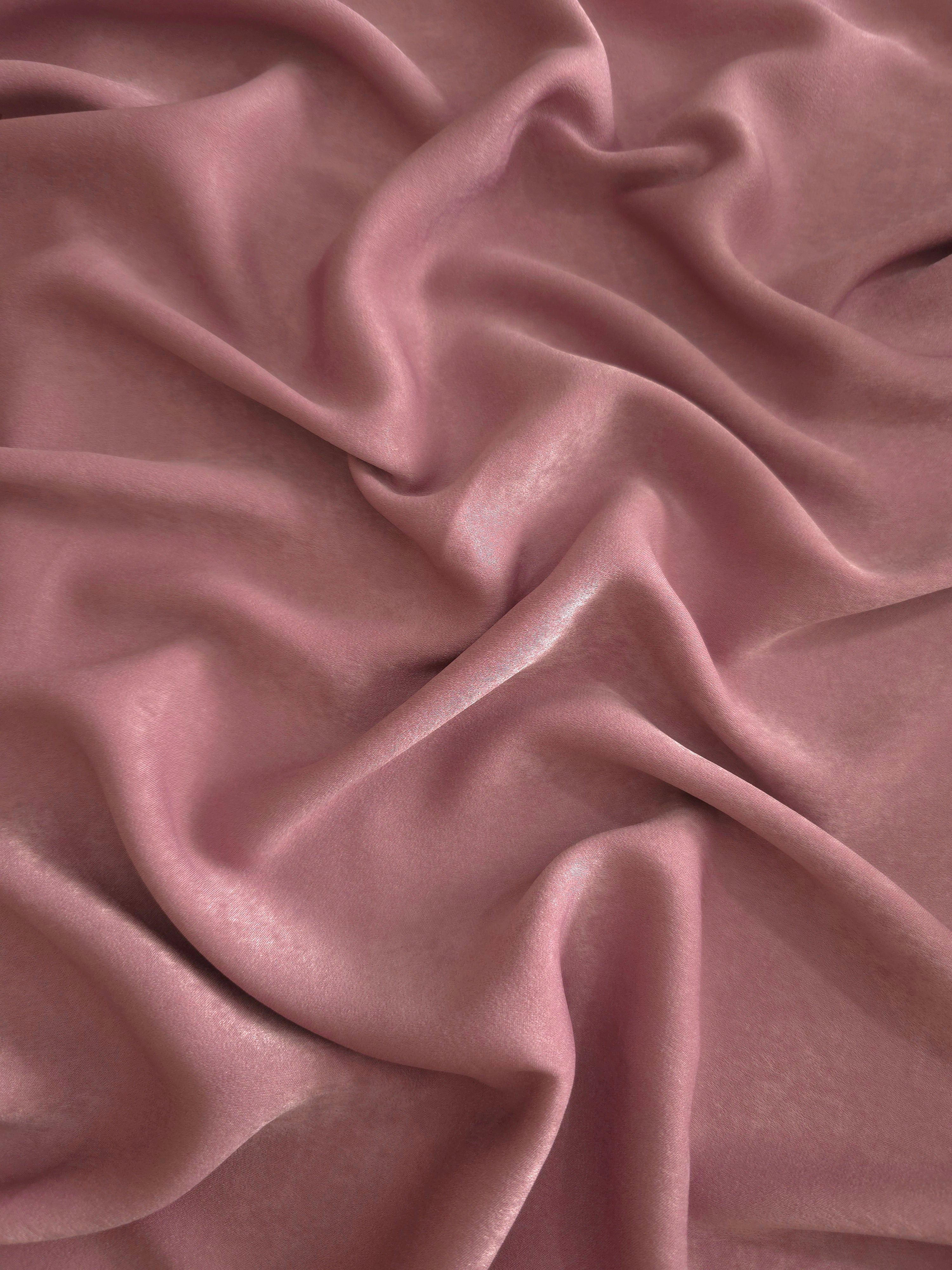 Milano matte sandwashed silky fabric in Rosewood Mauve, shown as a soft textile for dresses, blouses and apparel