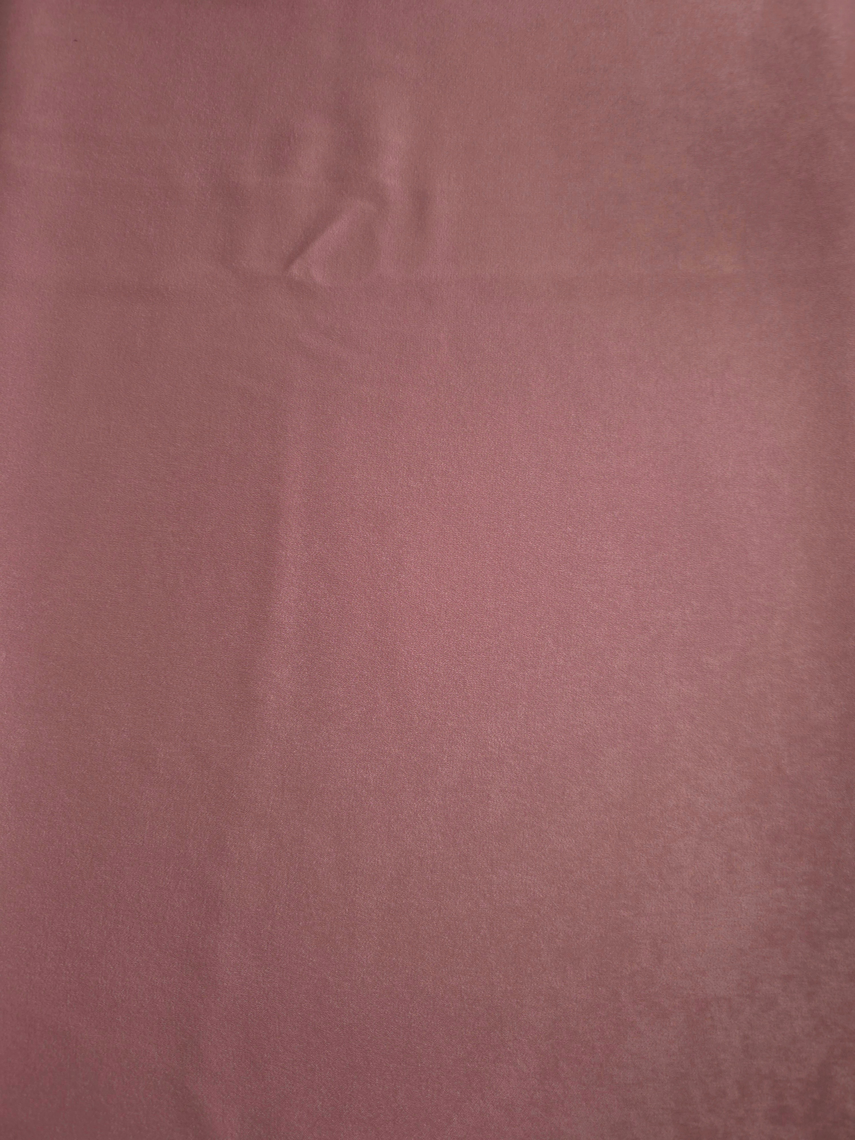 Draped Rosewood Mauve Milano matte sandwashed silky fabric showing fluid movement for dresses and occasionwear