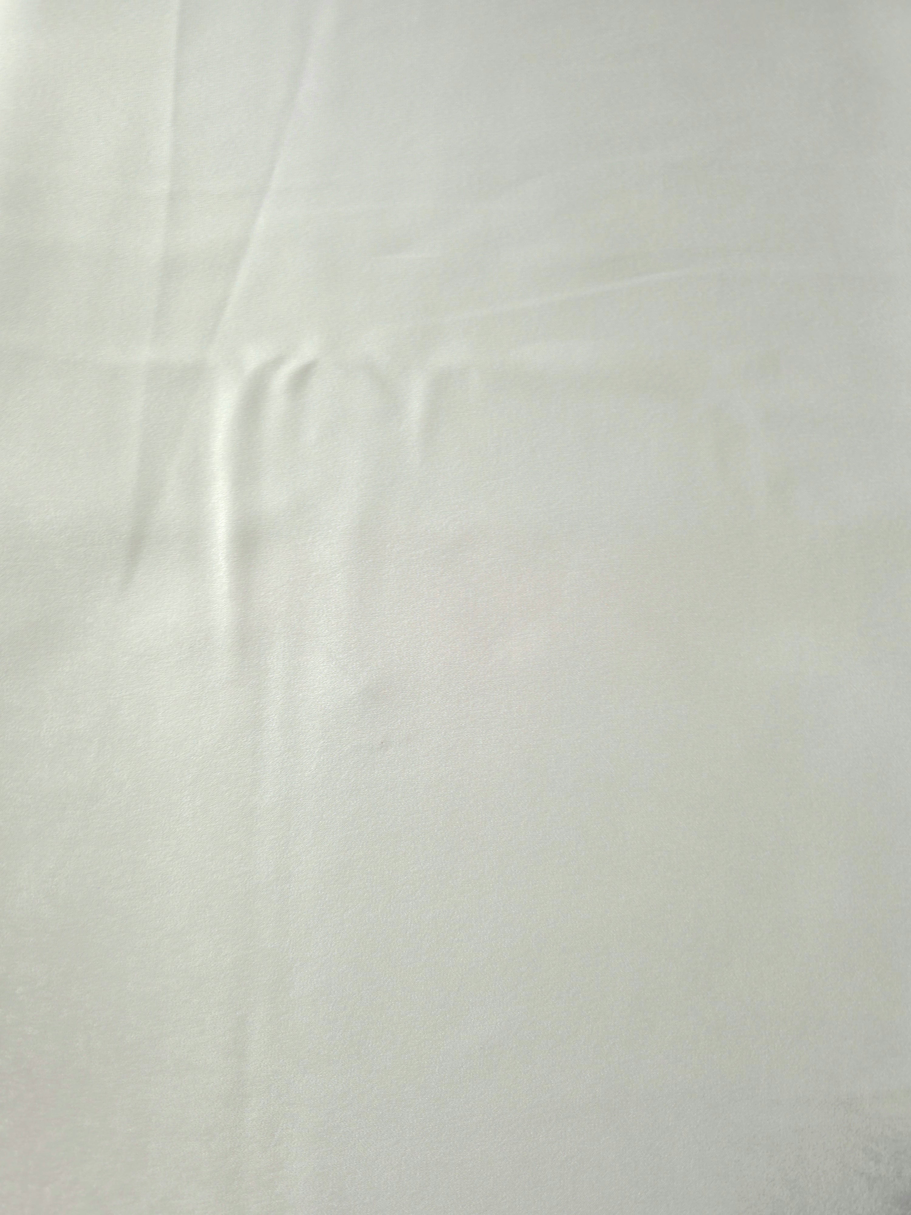 Draped Silver Sage Milano matte sandwashed silky fabric showing fluid movement for dresses and occasionwear