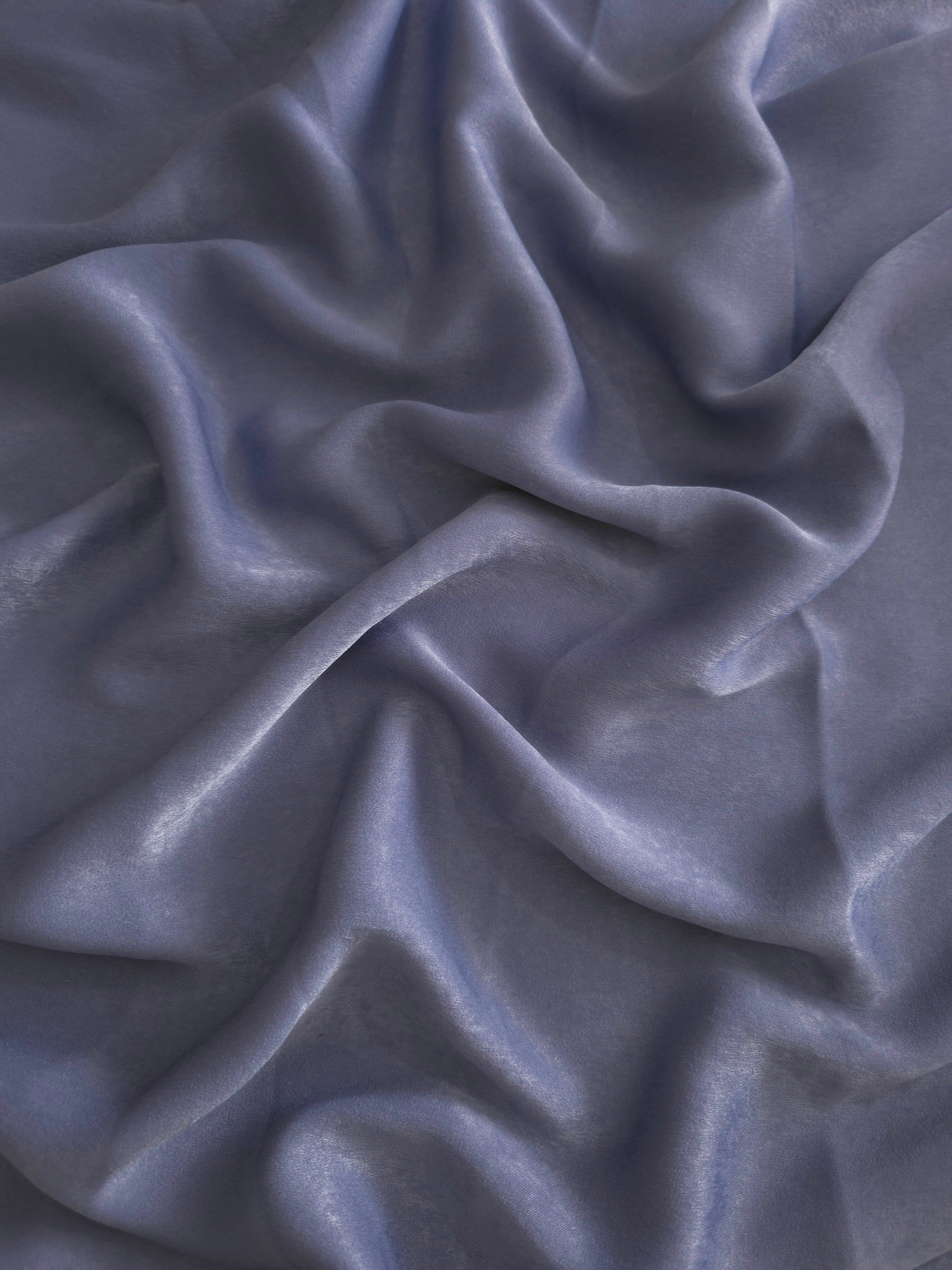 Milano matte sandwashed silky fabric in Slate Lavender, shown as a soft textile for dresses, blouses and apparel