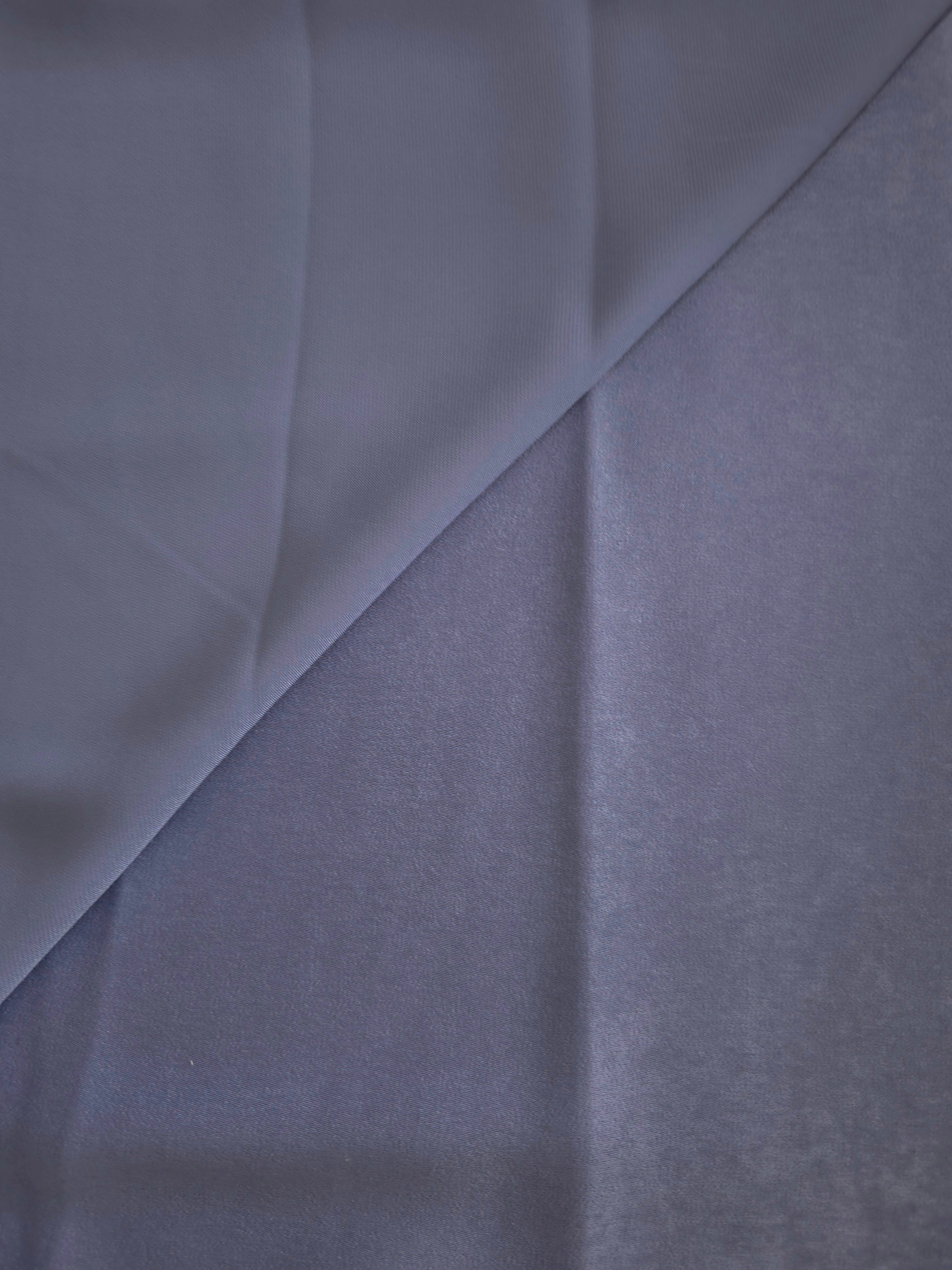 Close-up of Slate Lavender Milano sandwashed silky fabric showing its smooth matte texture and soft surface