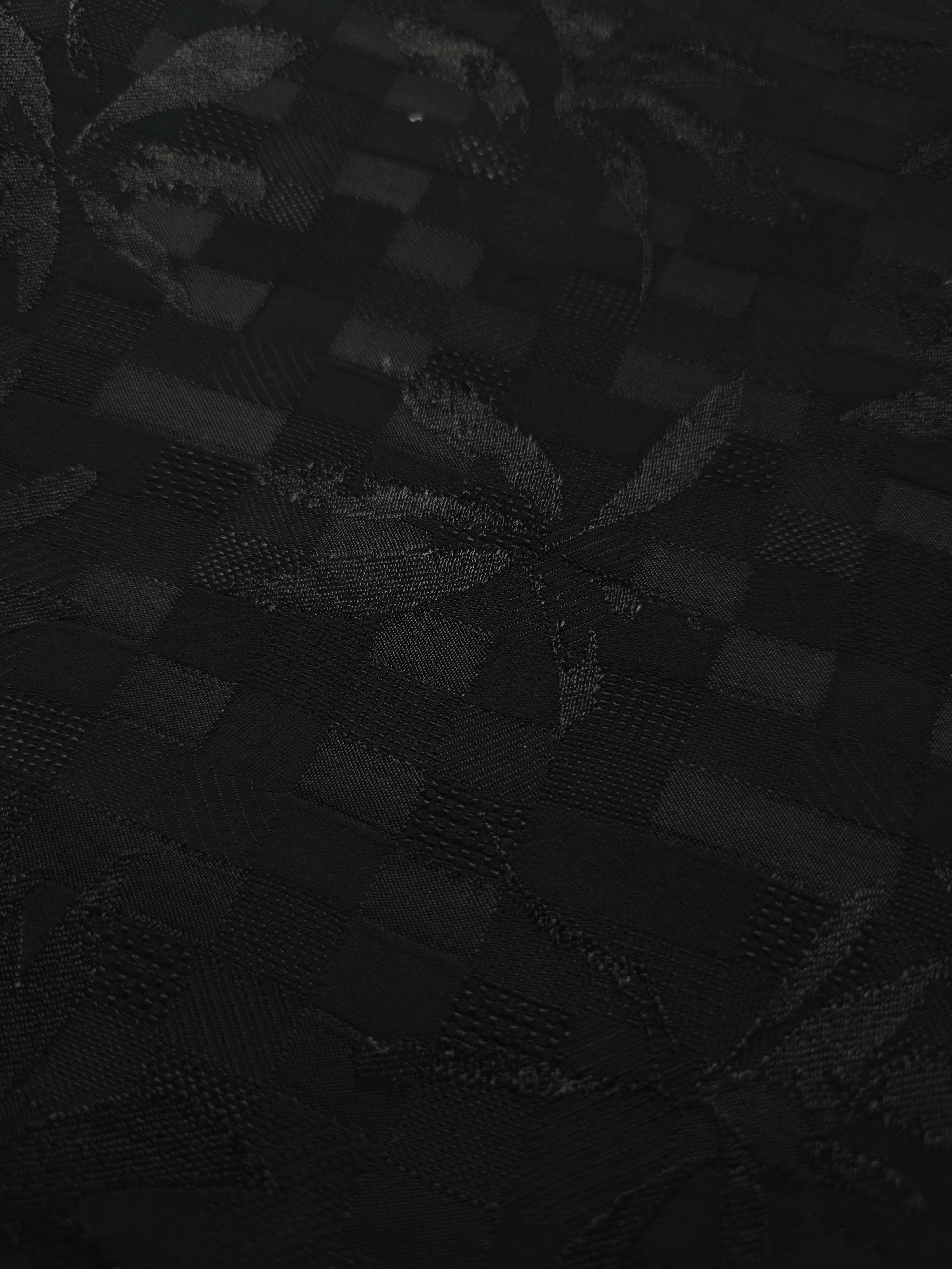Close-up of flower brick jacquard in another colourway showing woven motif.