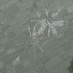 Close-up of flower brick jacquard colourway showing square-weave texture.