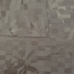 Front and back view of tonal flower brick jacquard for lining checks.