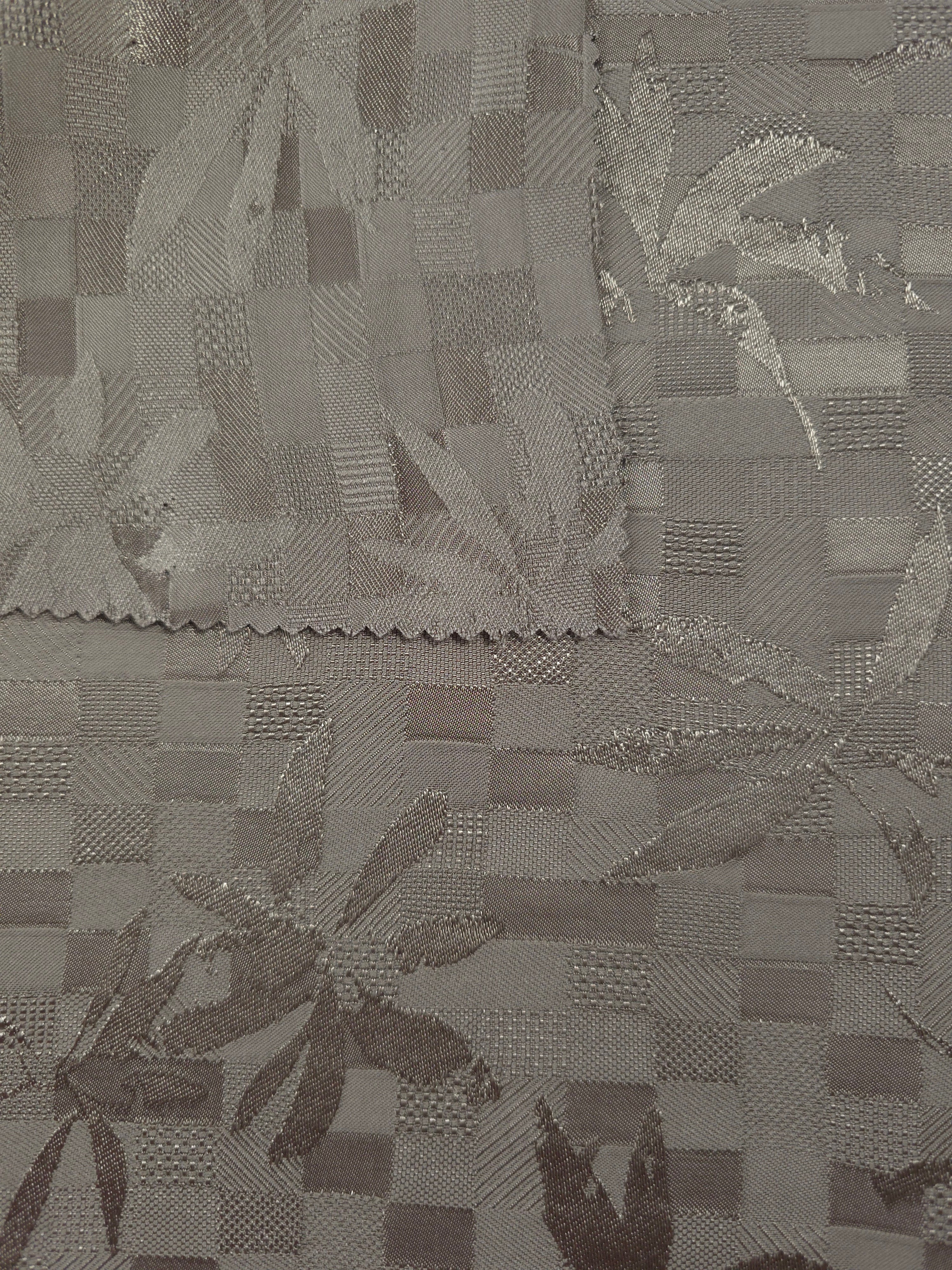 Front and back view of tonal flower brick jacquard for lining checks.