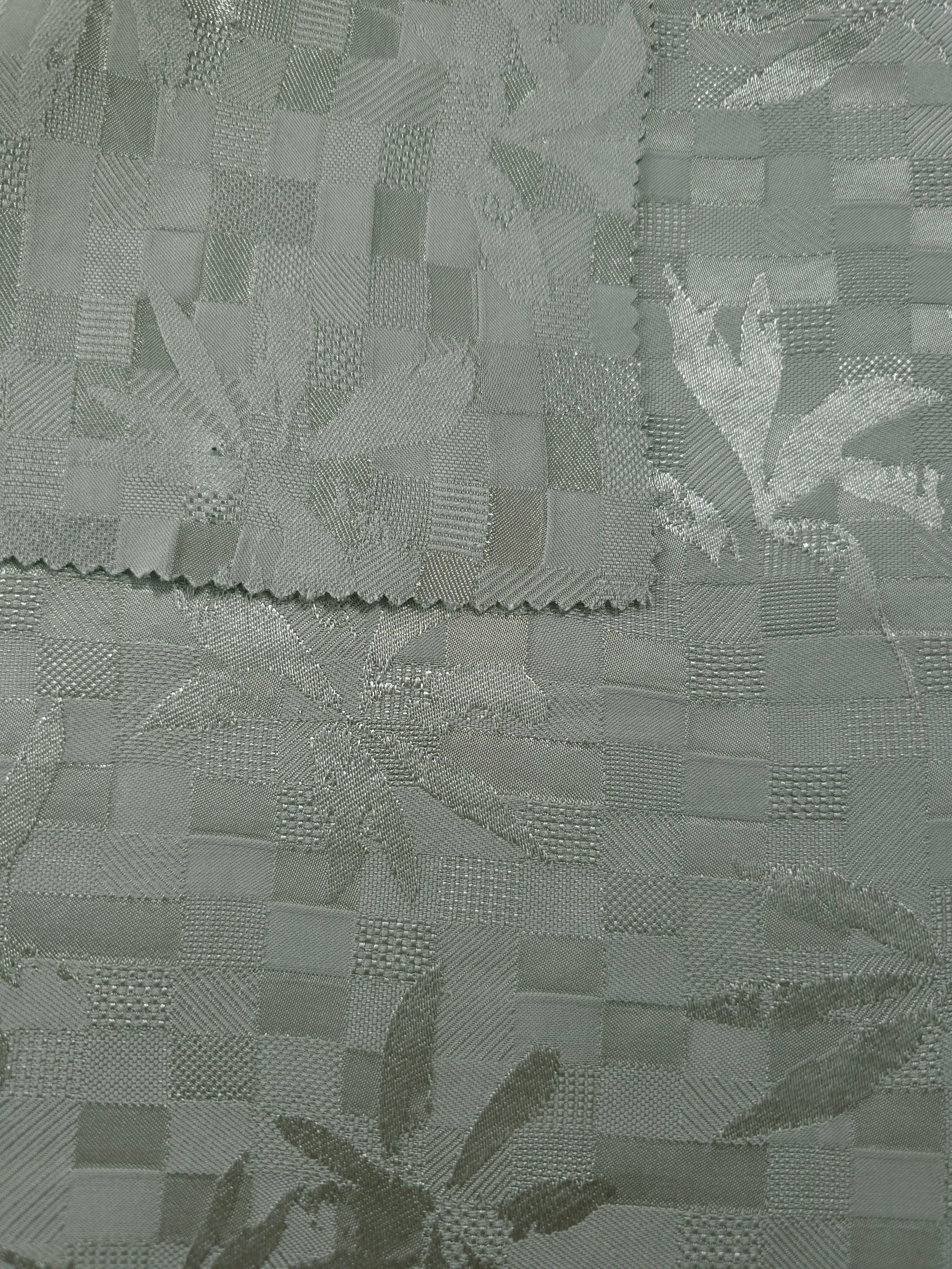 Front and back view of flower brick jacquard colourway for texture checks.