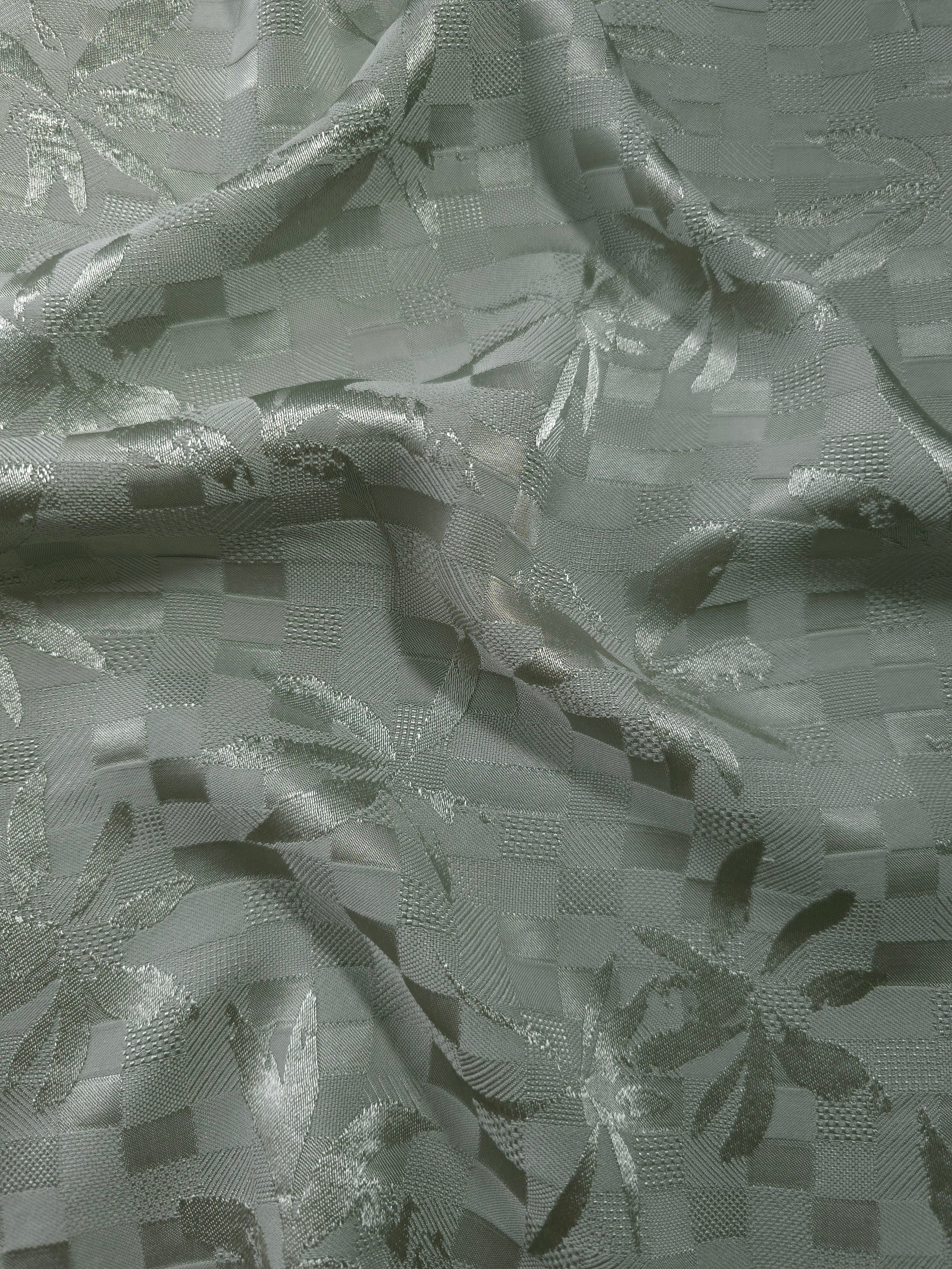 Wave fold of flower brick jacquard colourway showing tonal motif.
