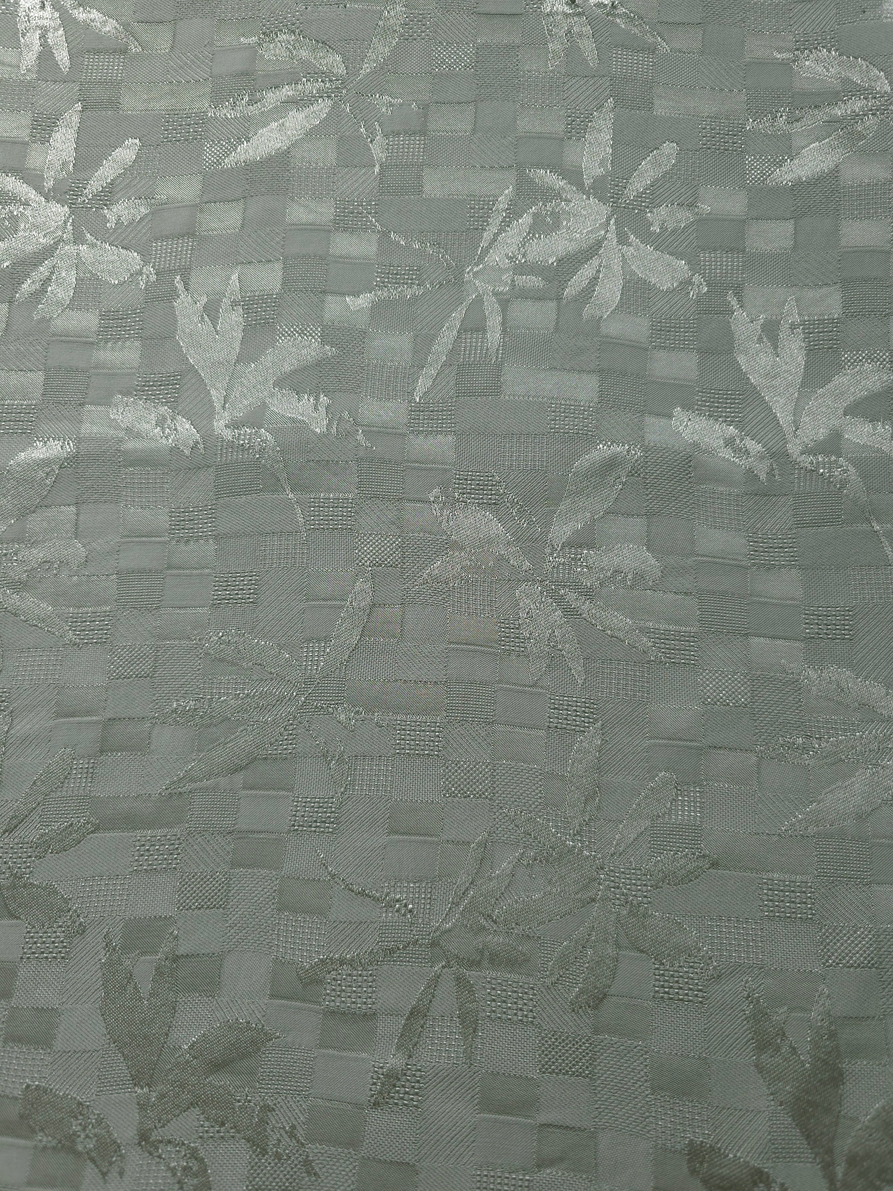 Wide view of flower brick jacquard colourway for dressmaking yardage.