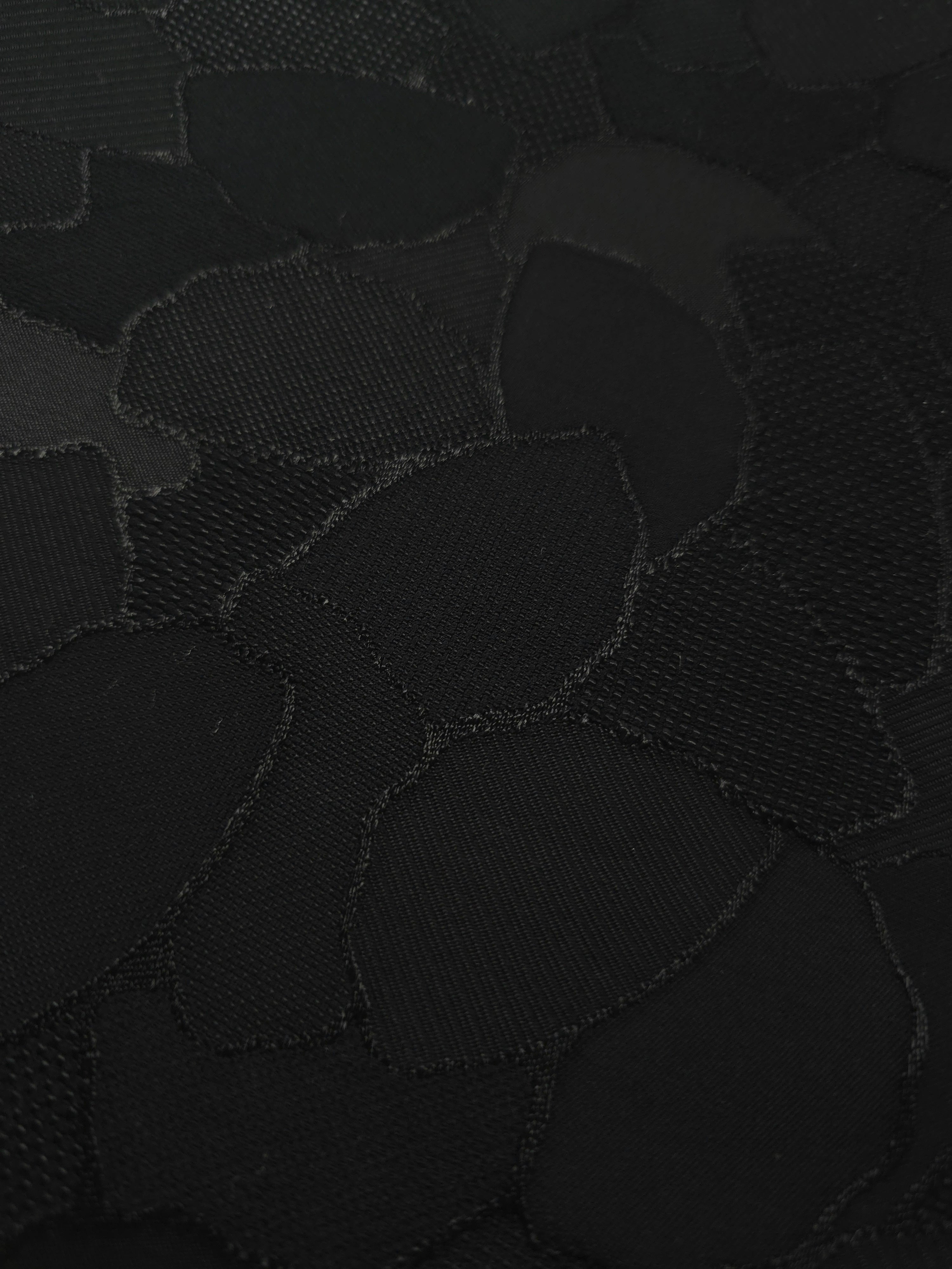 Close-up of mosaic jacquard in another colourway showing woven motif.