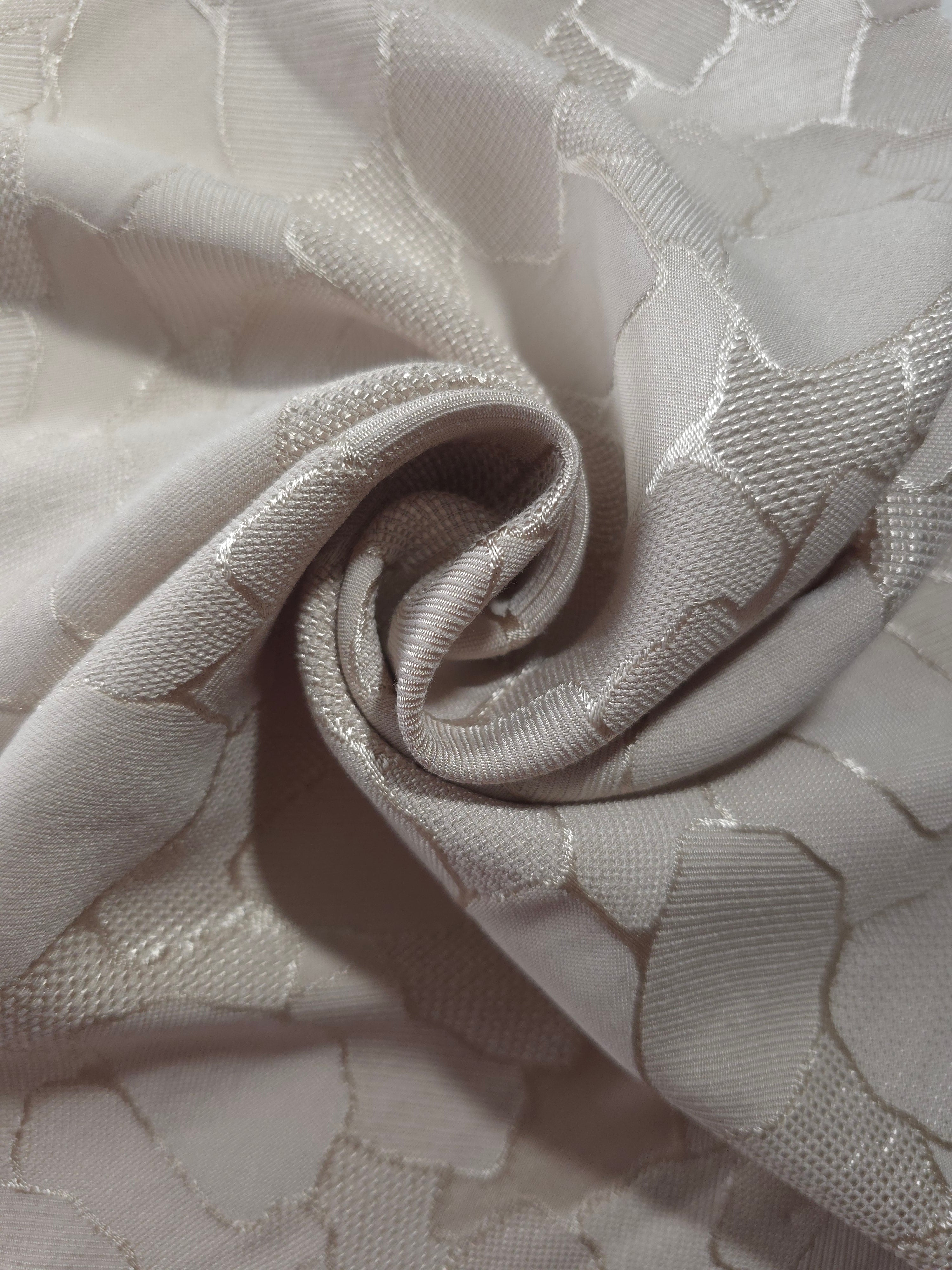 Draped mosaic square-weave jacquard showing tonal floss satin motif for dresses.