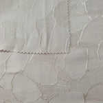 Front and back view of mosaic square-weave jacquard for texture checks.