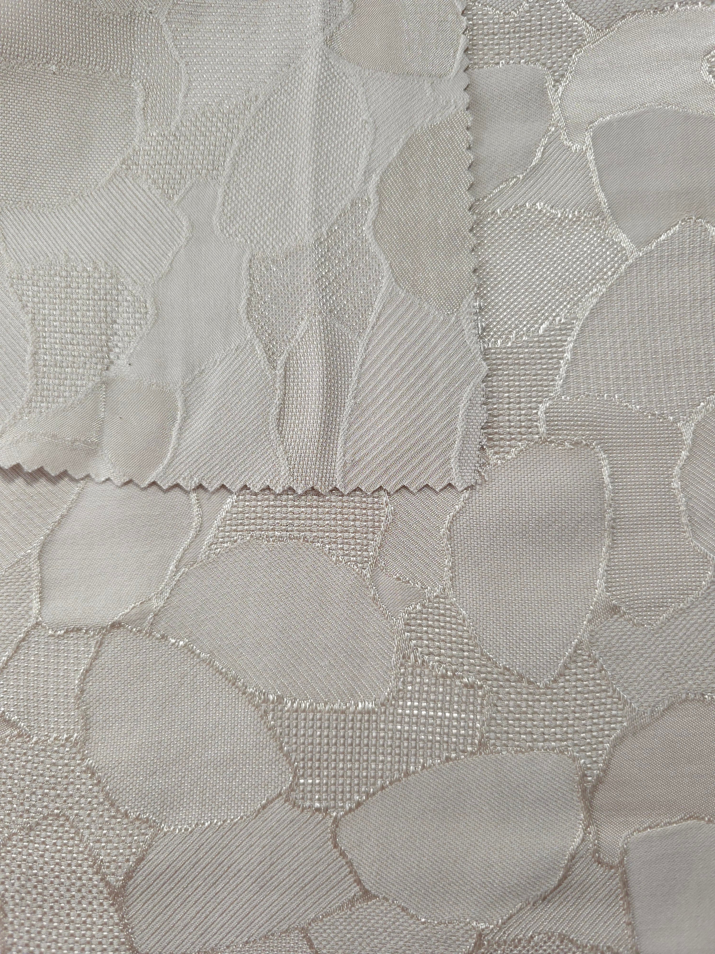 Front and back view of mosaic square-weave jacquard for texture checks.