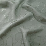 Wave fold of mosaic jacquard colourway showing tonal satin motif.