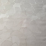 Wide view of mosaic square-weave jacquard fabric for dresses and separates.