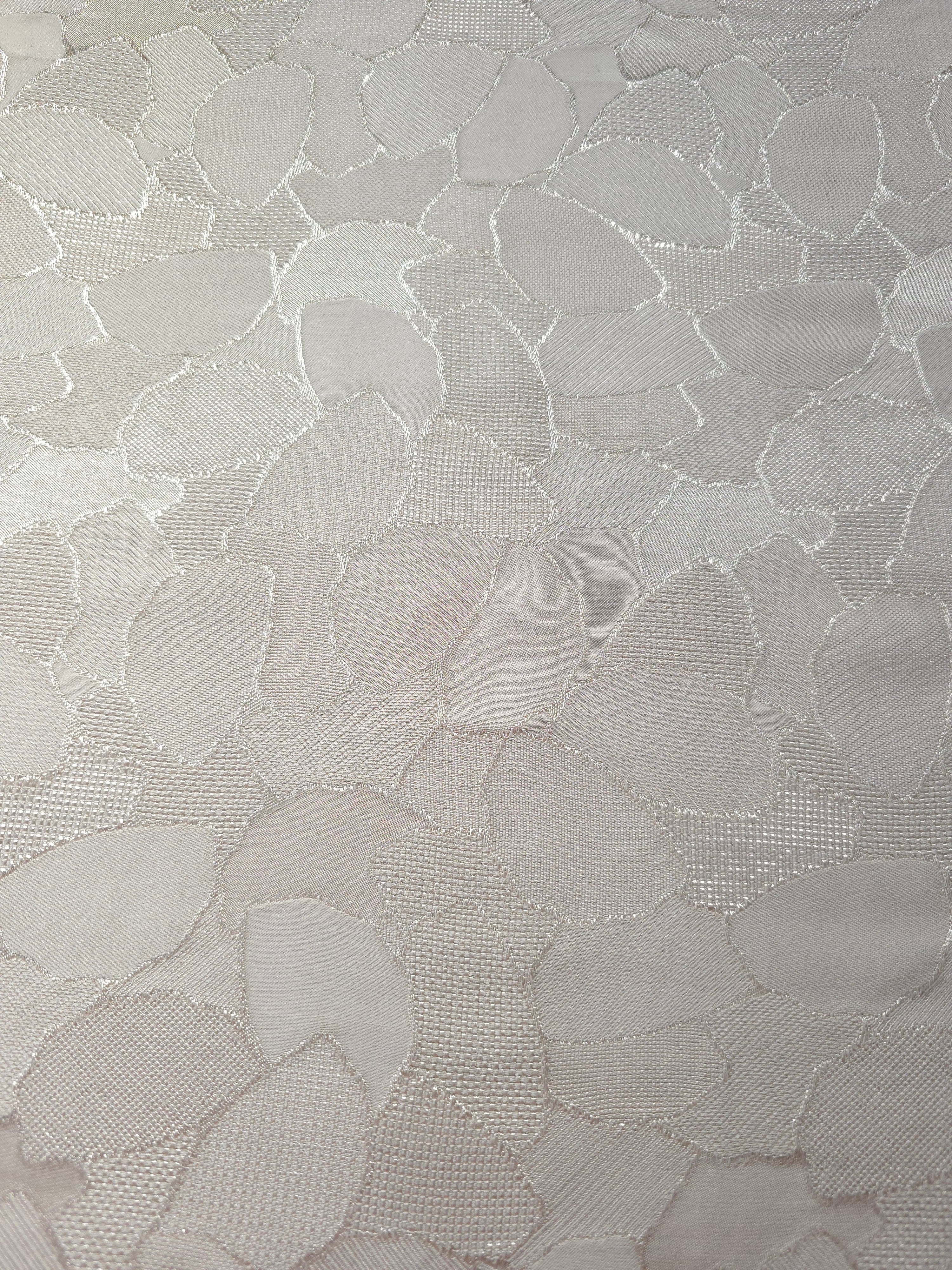 Wide view of mosaic square-weave jacquard fabric for dresses and separates.