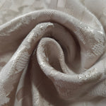 Close drape of splash brick jacquard showing fold detail and soft sheen.