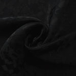 Draped splash brick jacquard in another colourway with soft square-weave texture.