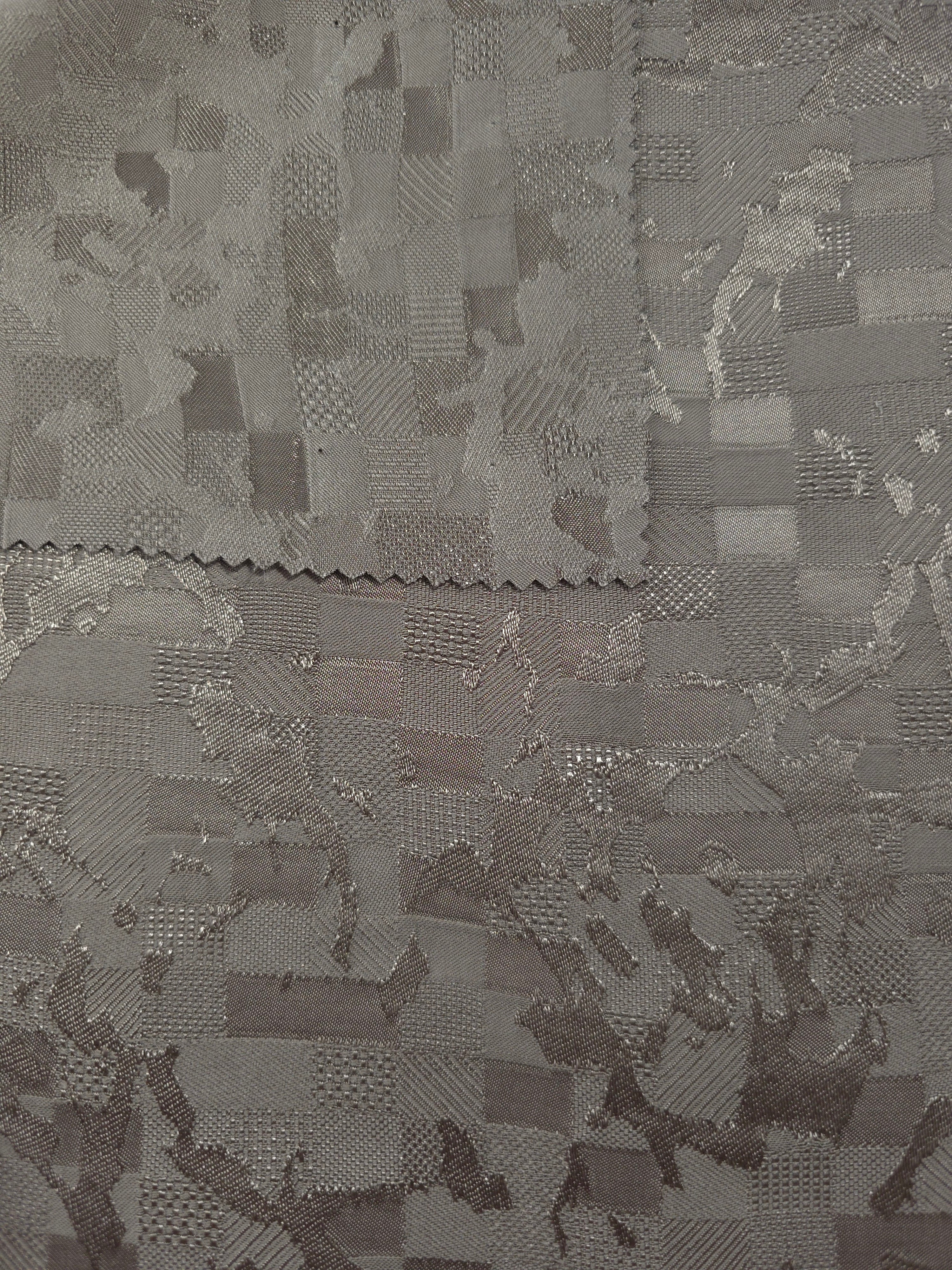 Front and back view of tonal splash brick jacquard for lining checks.