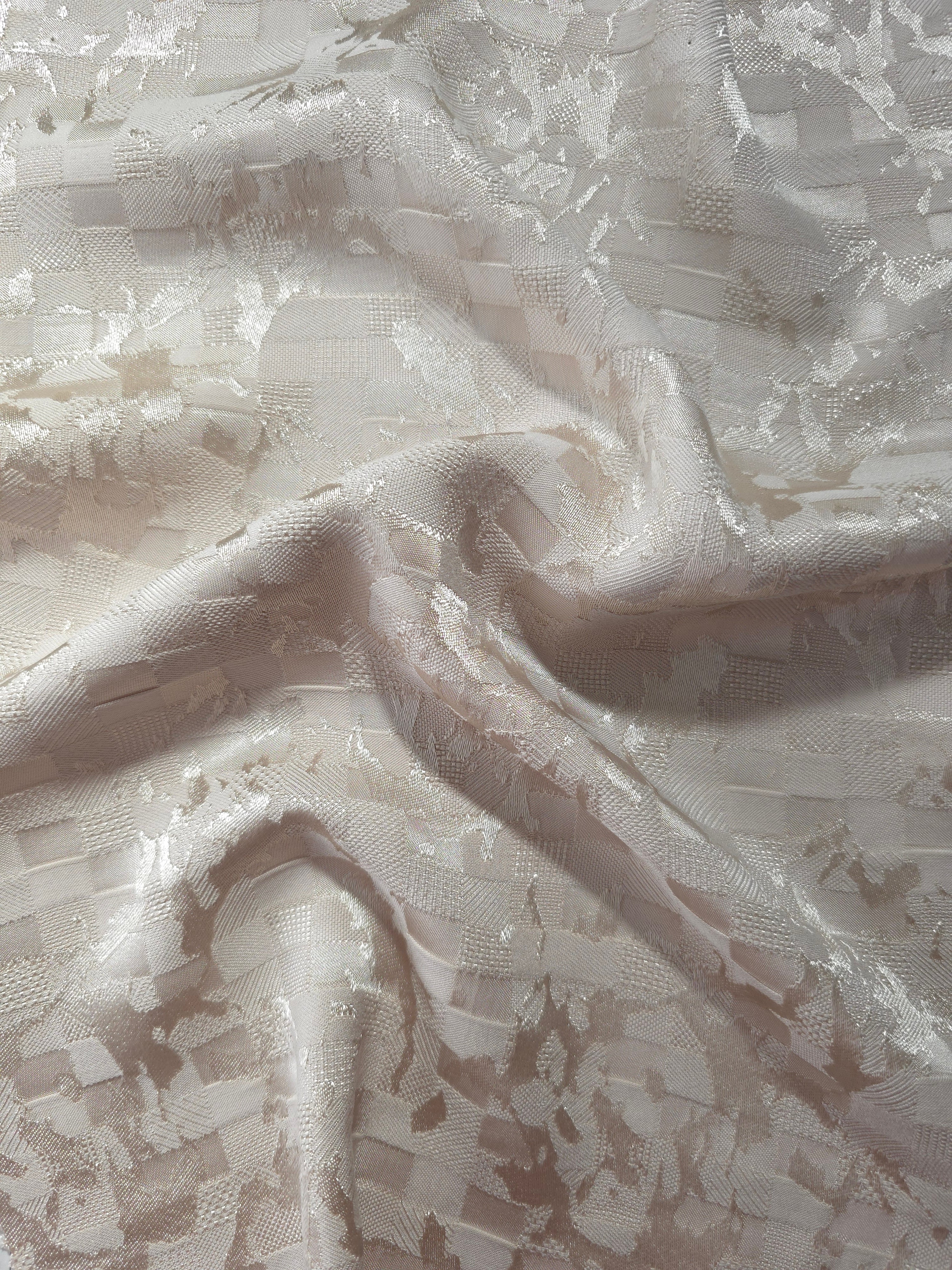 Wave fold of splash brick jacquard showing satin-on-matte woven pattern.
