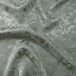 Wave fold of splash brick jacquard colourway showing tonal motif.