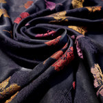 Close-up drape shot of raised Moroccan-inspired jacquard texture on rayon viscose fabric