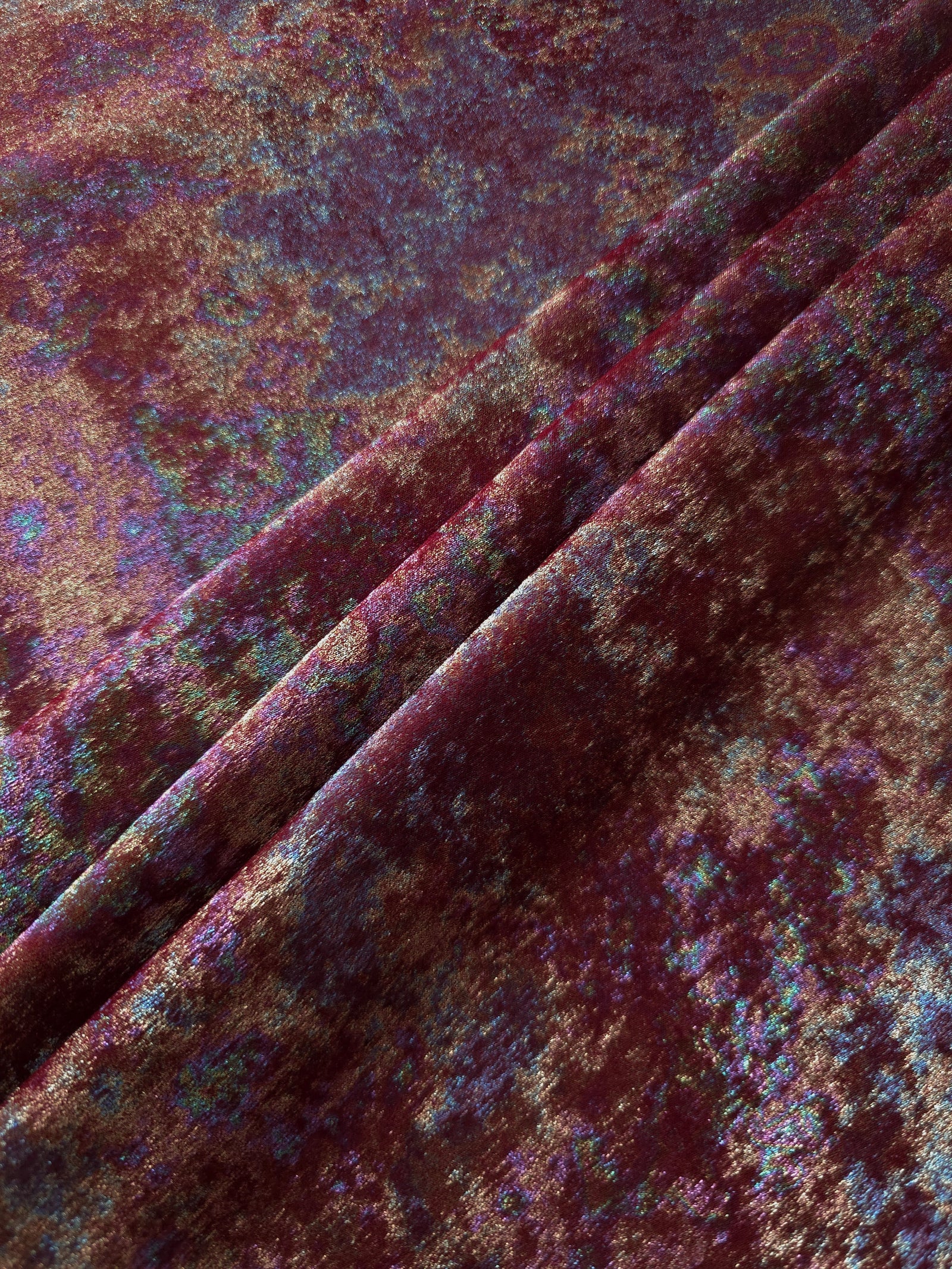 MilanSaten Rainbow Foil fabric in Burgundy, shade 04 — macro shimmer close-up