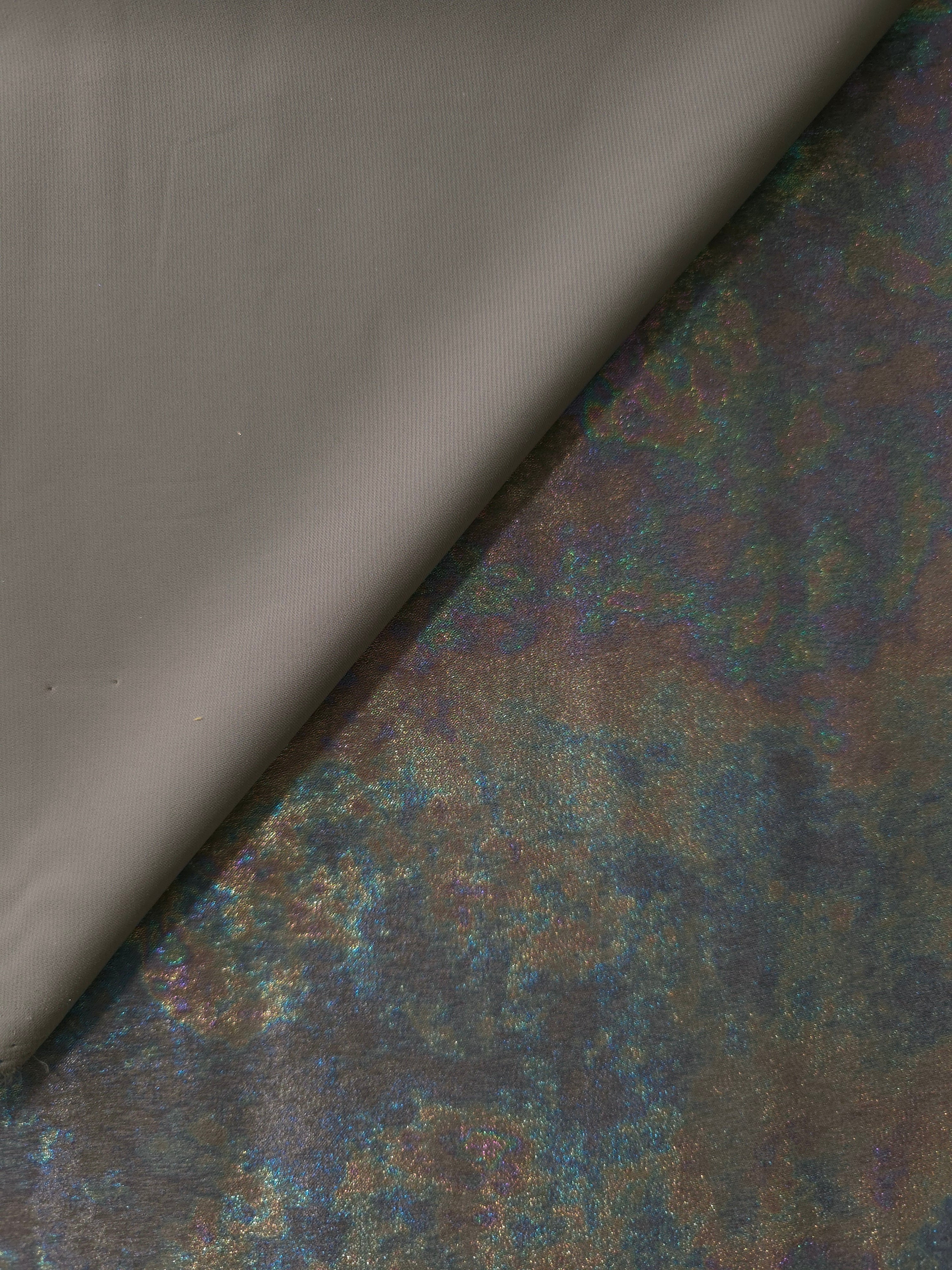 MilanSaten Rainbow Foil fabric in Graphite, shade 108 — full drape view