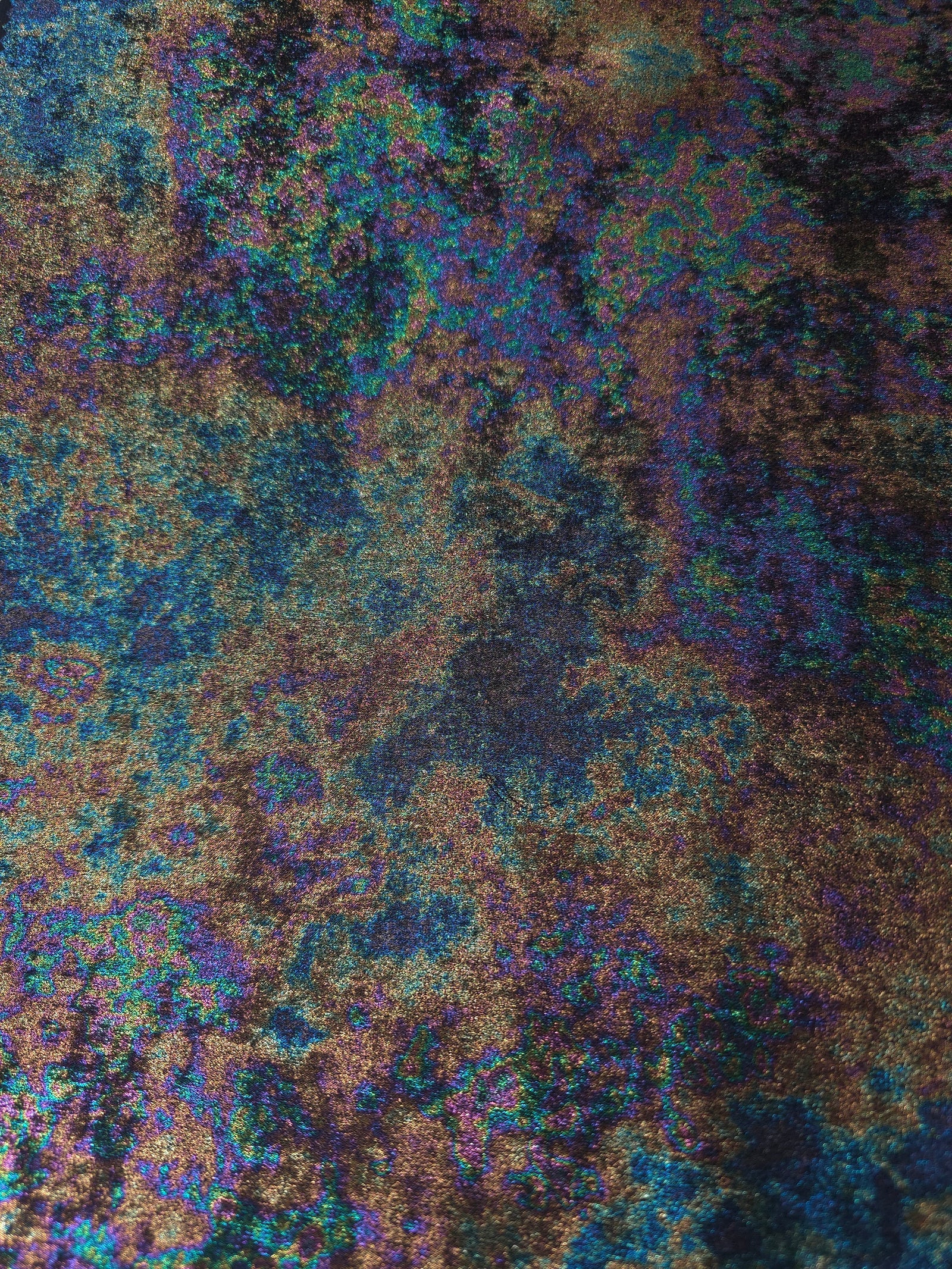 MilanSaten Rainbow Foil fabric in Teal Charcoal, shade 12 — folded fabric view