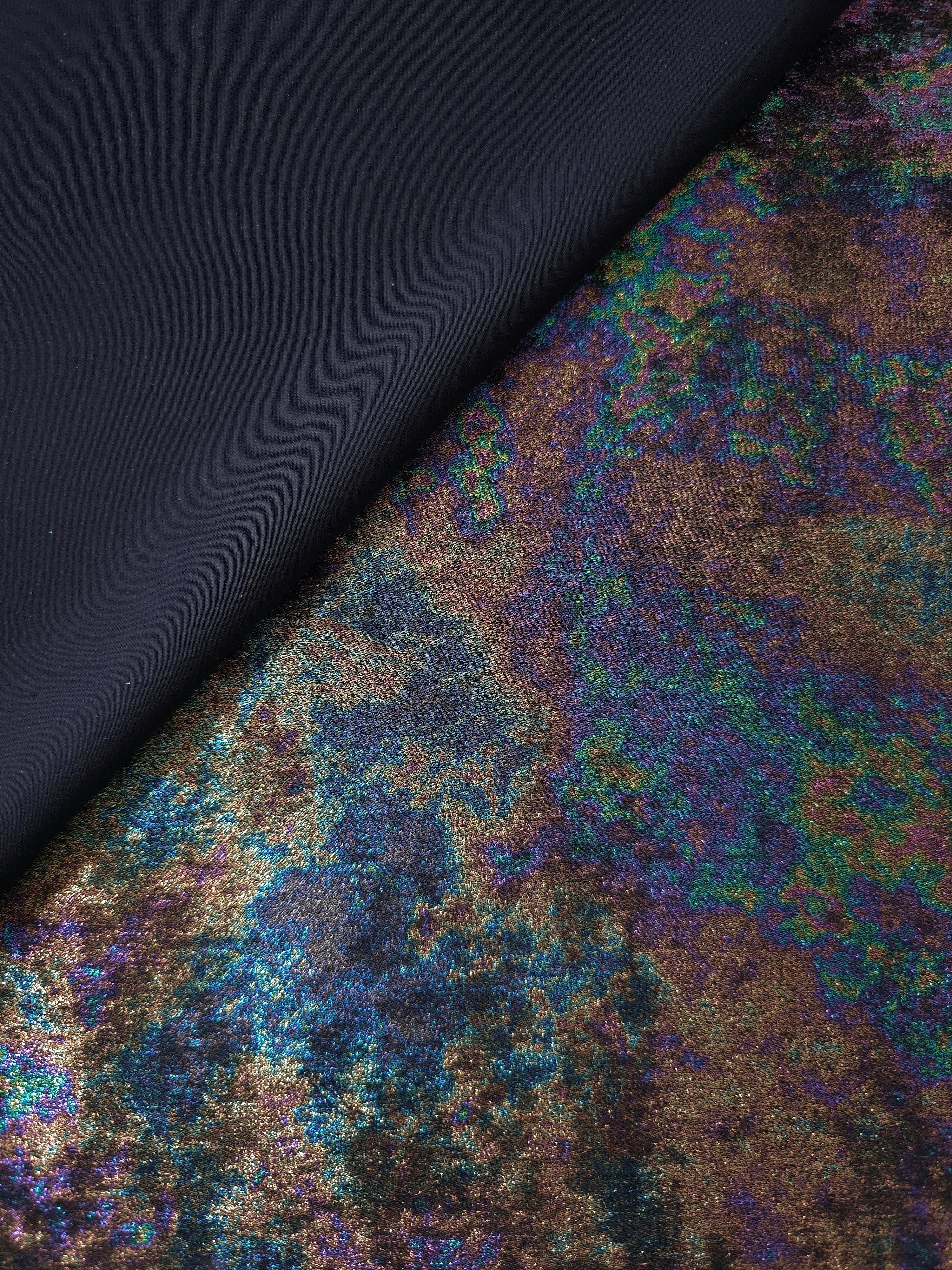 MilanSaten Rainbow Foil fabric in Teal Charcoal, shade 12 — full drape view