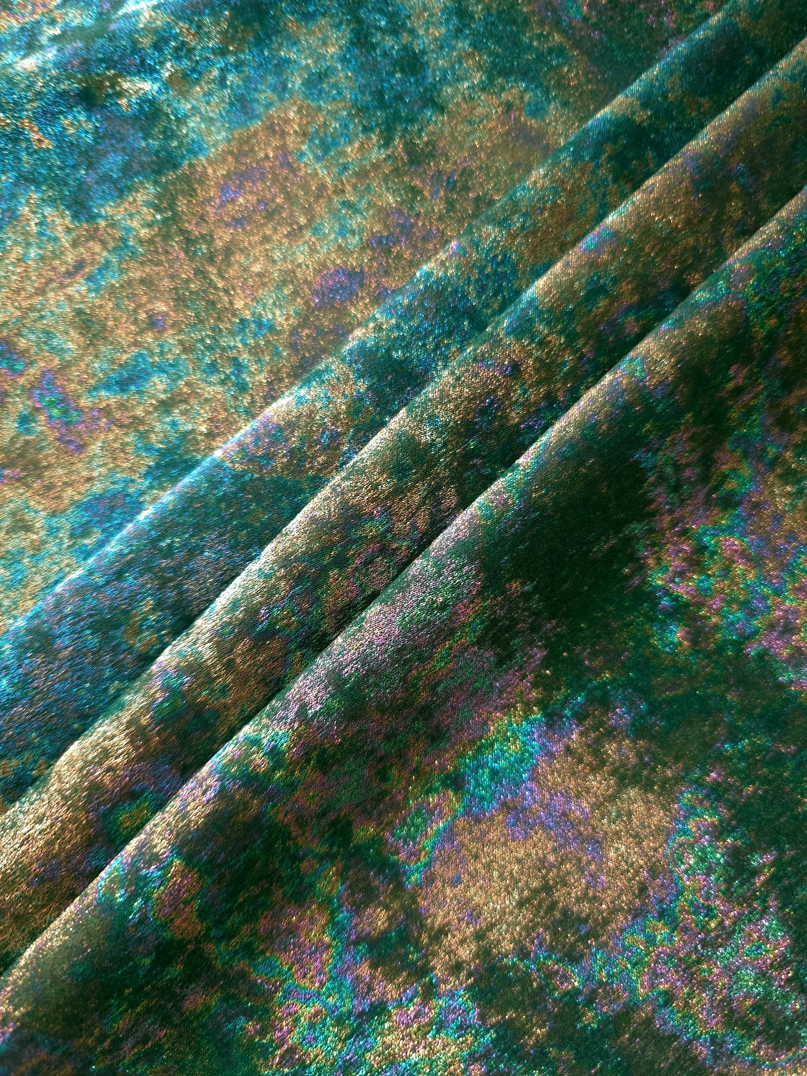 MilanSaten Rainbow Foil fabric in Emerald Green, shade 93 — macro shimmer close-up