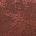 Close detail of animal print rayon jacquard with woven texture.