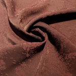 Animal print rayon jacquard drape view with opaque woven body.