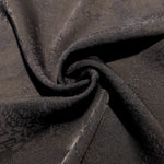 Structured animal print rayon jacquard drape view for statement layers.