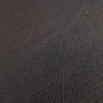 Close detail of structured flat motif jacquard with woven surface.