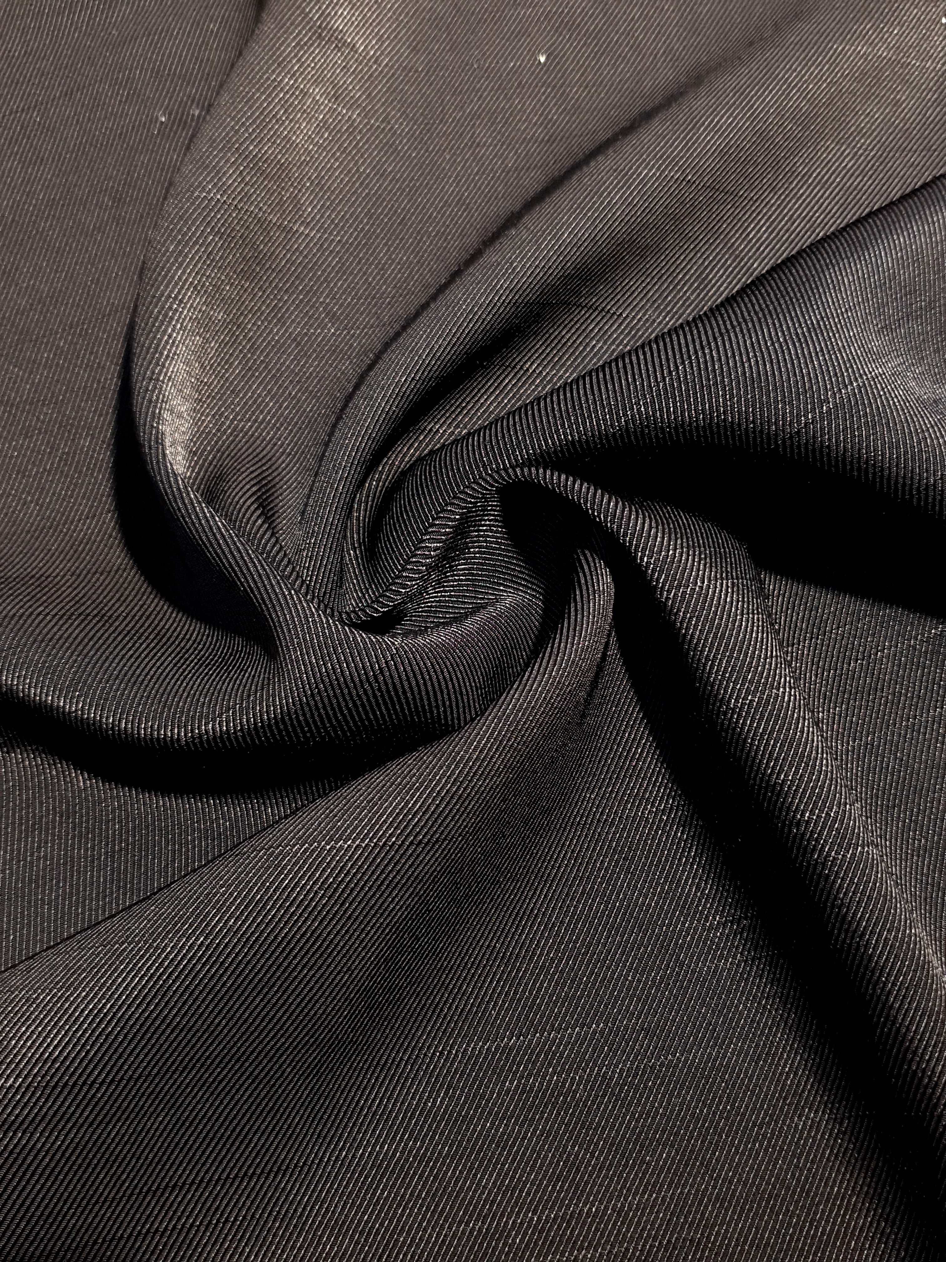 Drape view of structured flat motif jacquard with soft crisp hand.