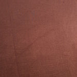Full view of flat motif rayon jacquard fabric for dressmaking.