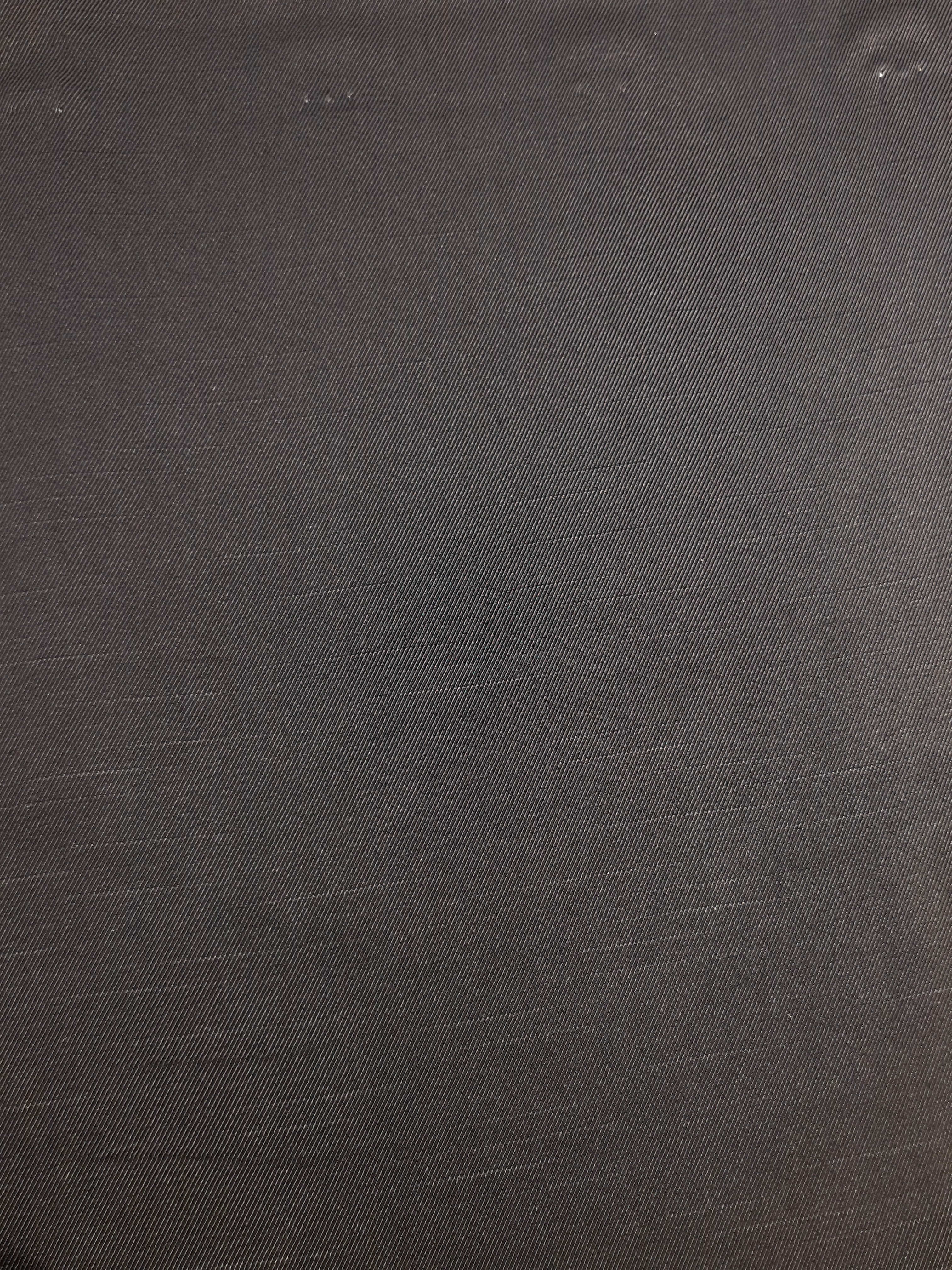 Full view of structured flat motif rayon jacquard for garment panels.