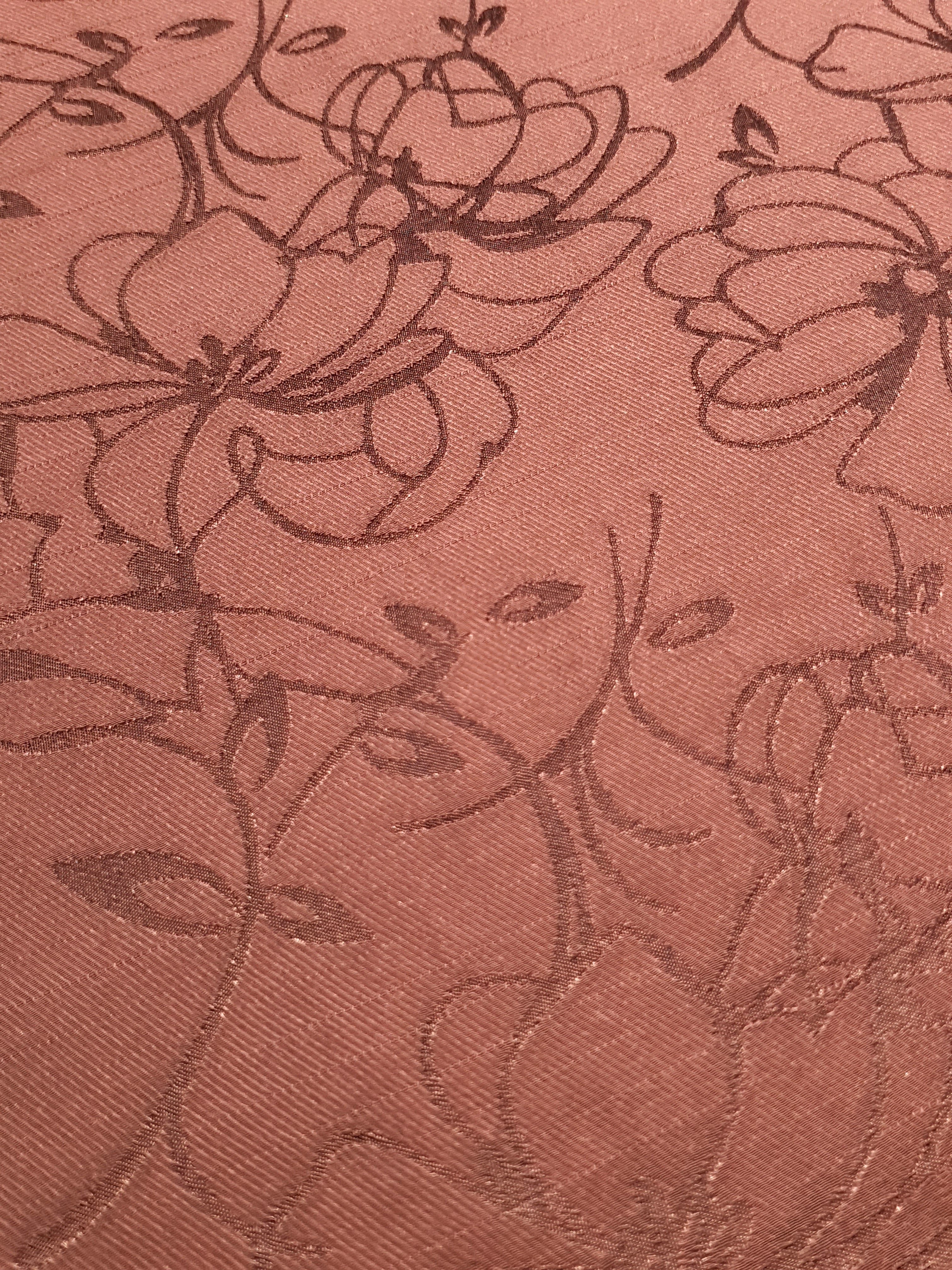Close view of floral rayon jacquard fabric.