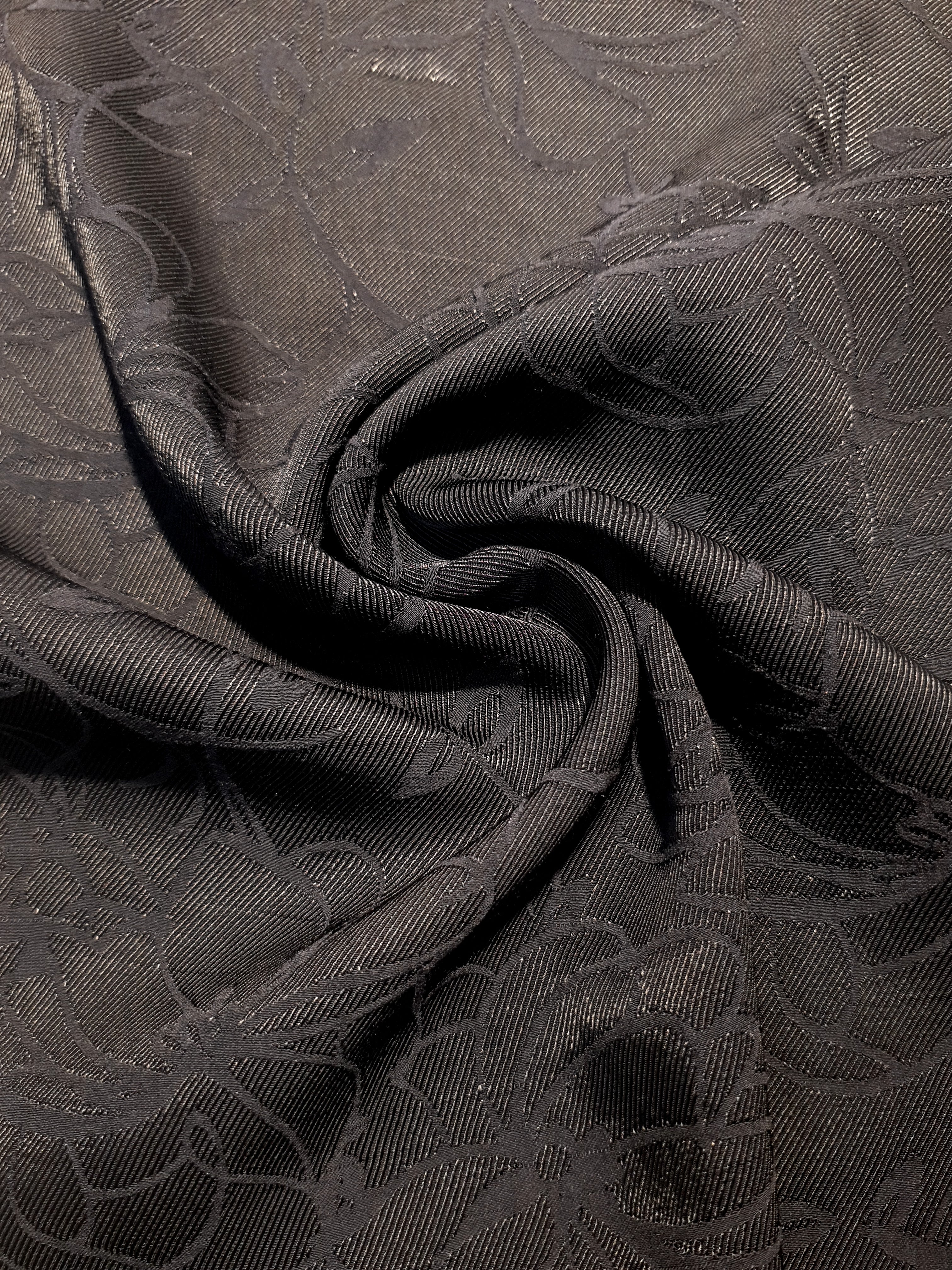 Structured floral rayon jacquard drape view for garment planning.