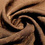 Drape detail of structured matrix motif jacquard for tailored layers.