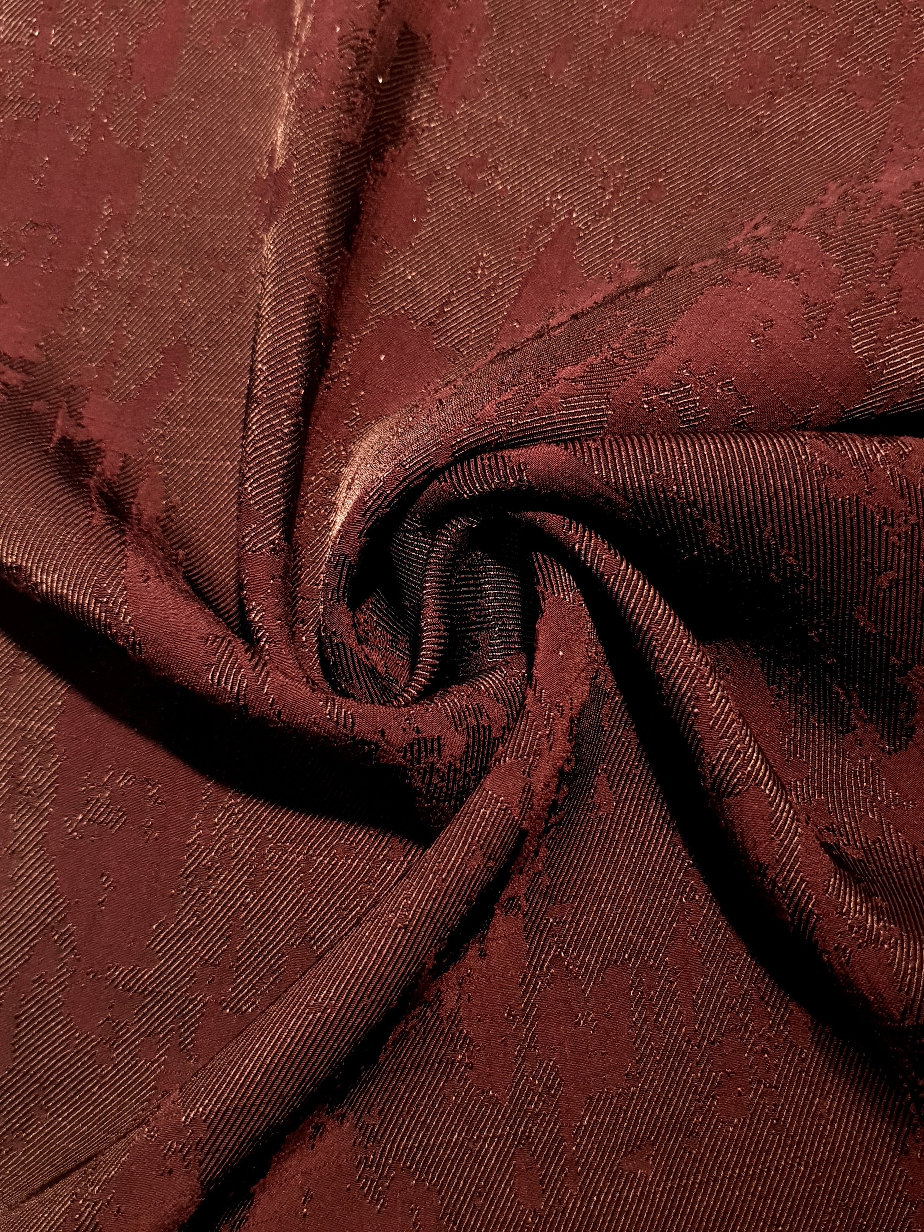 Matrix motif rayon jacquard drape view with opaque woven body.