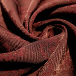 Drape detail of pansy flower rayon jacquard for dresses and layers.